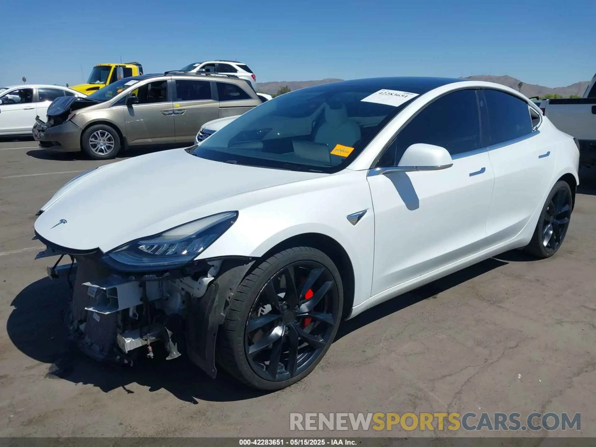 2 fotografías del automóvil dañado 5YJ3E1EC1LF719240 TESLA MODEL 3 2020