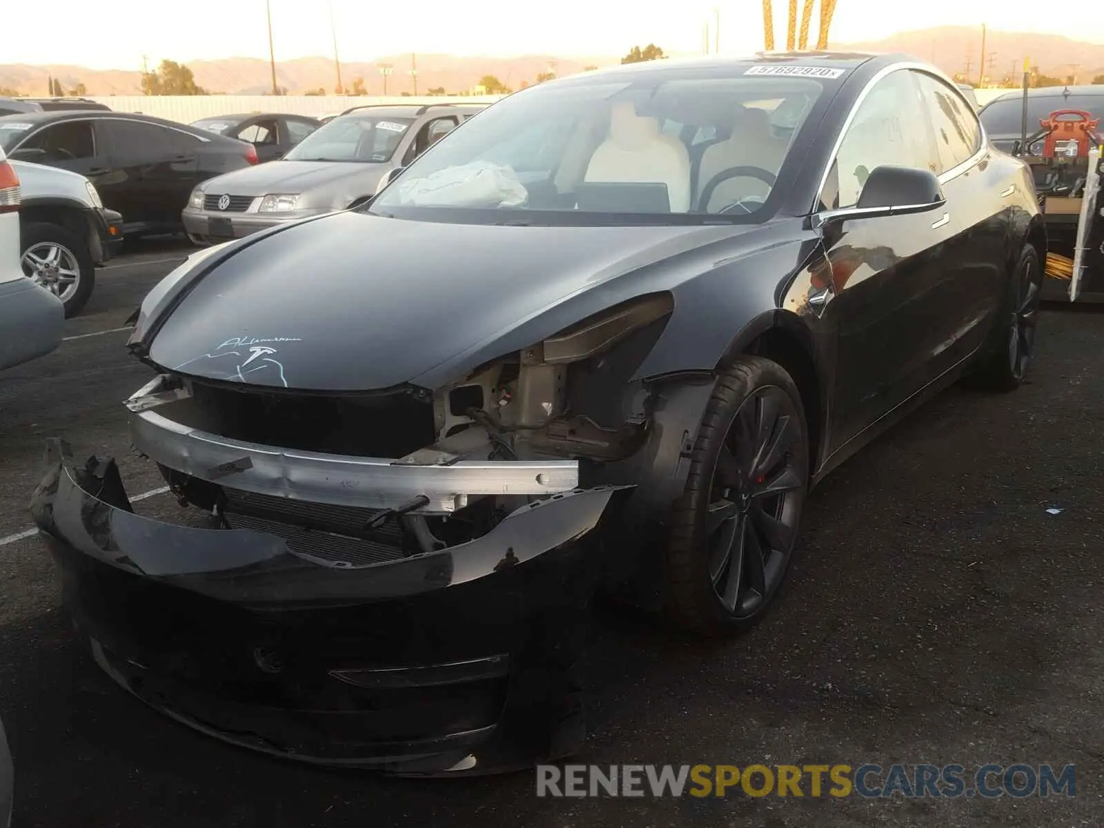 2 fotografías del automóvil dañado 5YJ3E1EC1LF774965 TESLA MODEL 3 2020