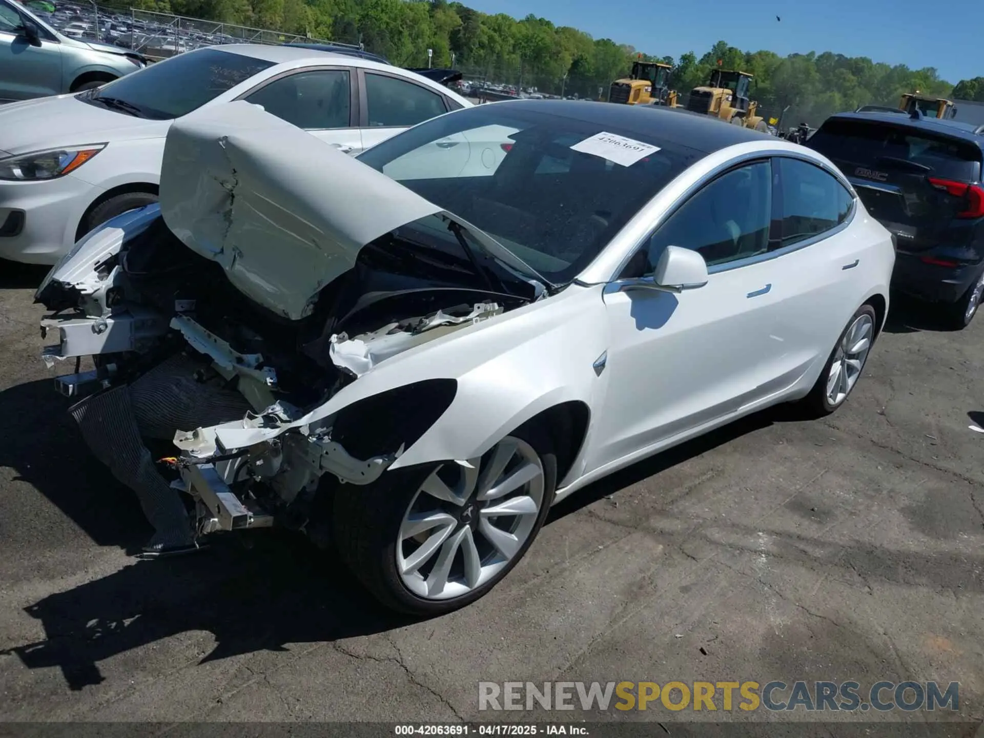 2 fotografías del automóvil dañado 5YJ3E1EC2LF587069 TESLA MODEL 3 2020