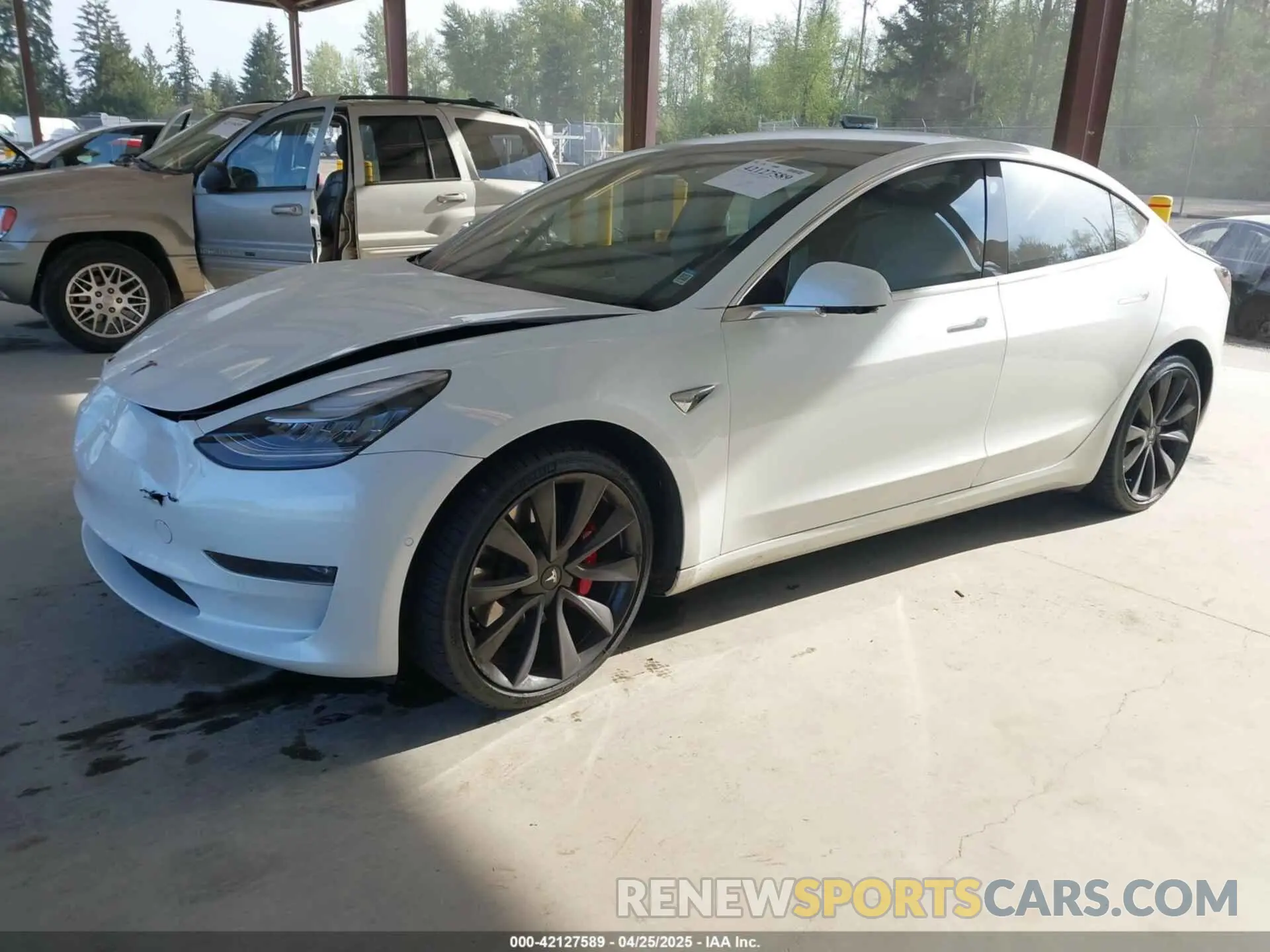 2 fotografías del automóvil dañado 5YJ3E1EC2LF624900 TESLA MODEL 3 2020