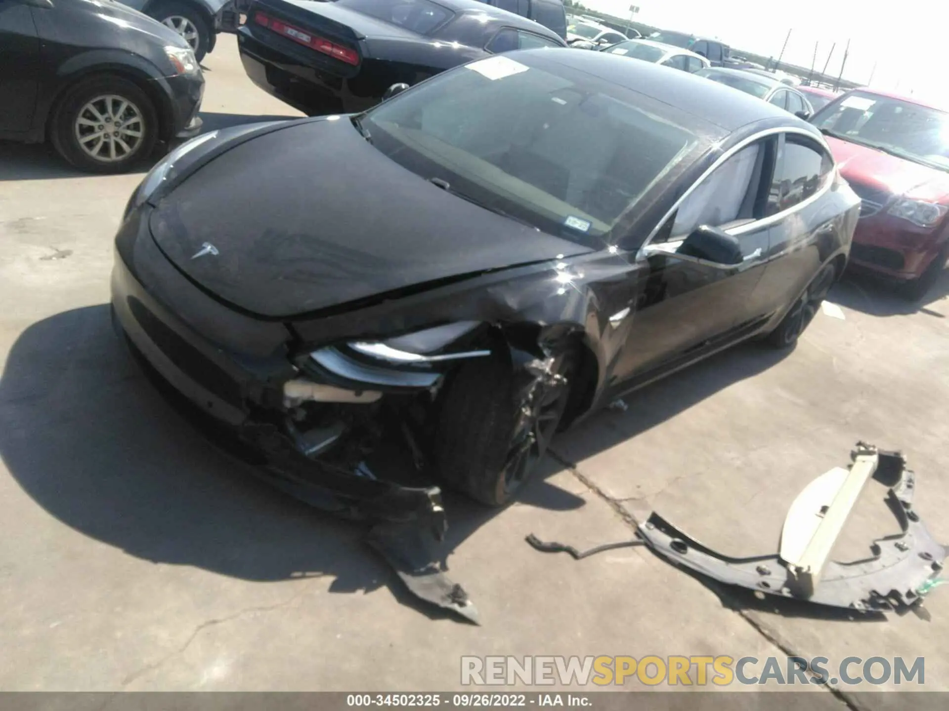 2 fotografías del automóvil dañado 5YJ3E1EC2LF641664 TESLA MODEL 3 2020