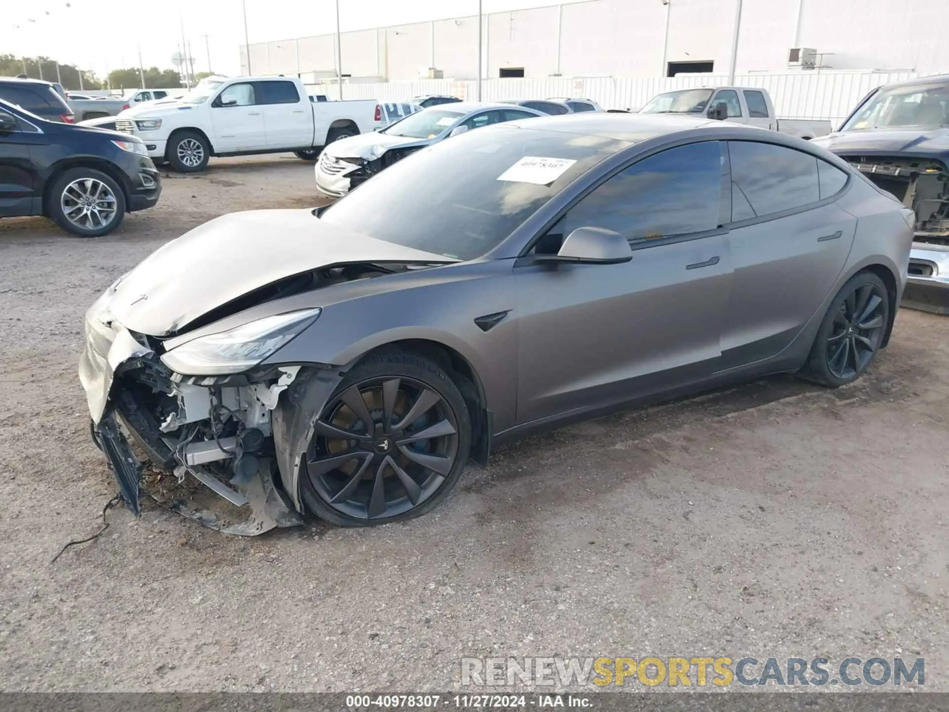 2 fotografías del automóvil dañado 5YJ3E1EC2LF792018 TESLA MODEL 3 2020