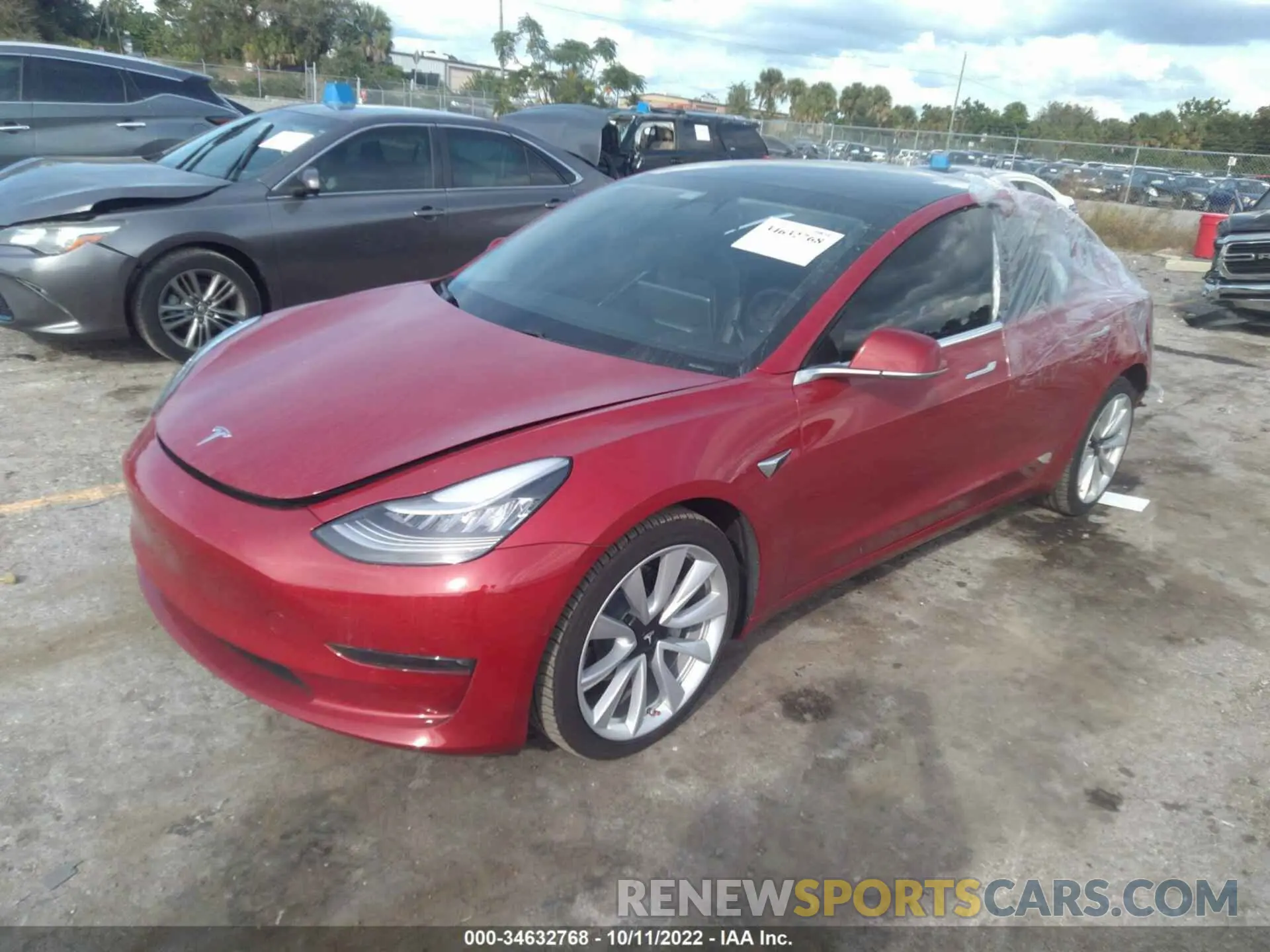 2 fotografías del automóvil dañado 5YJ3E1EC3LF586769 TESLA MODEL 3 2020