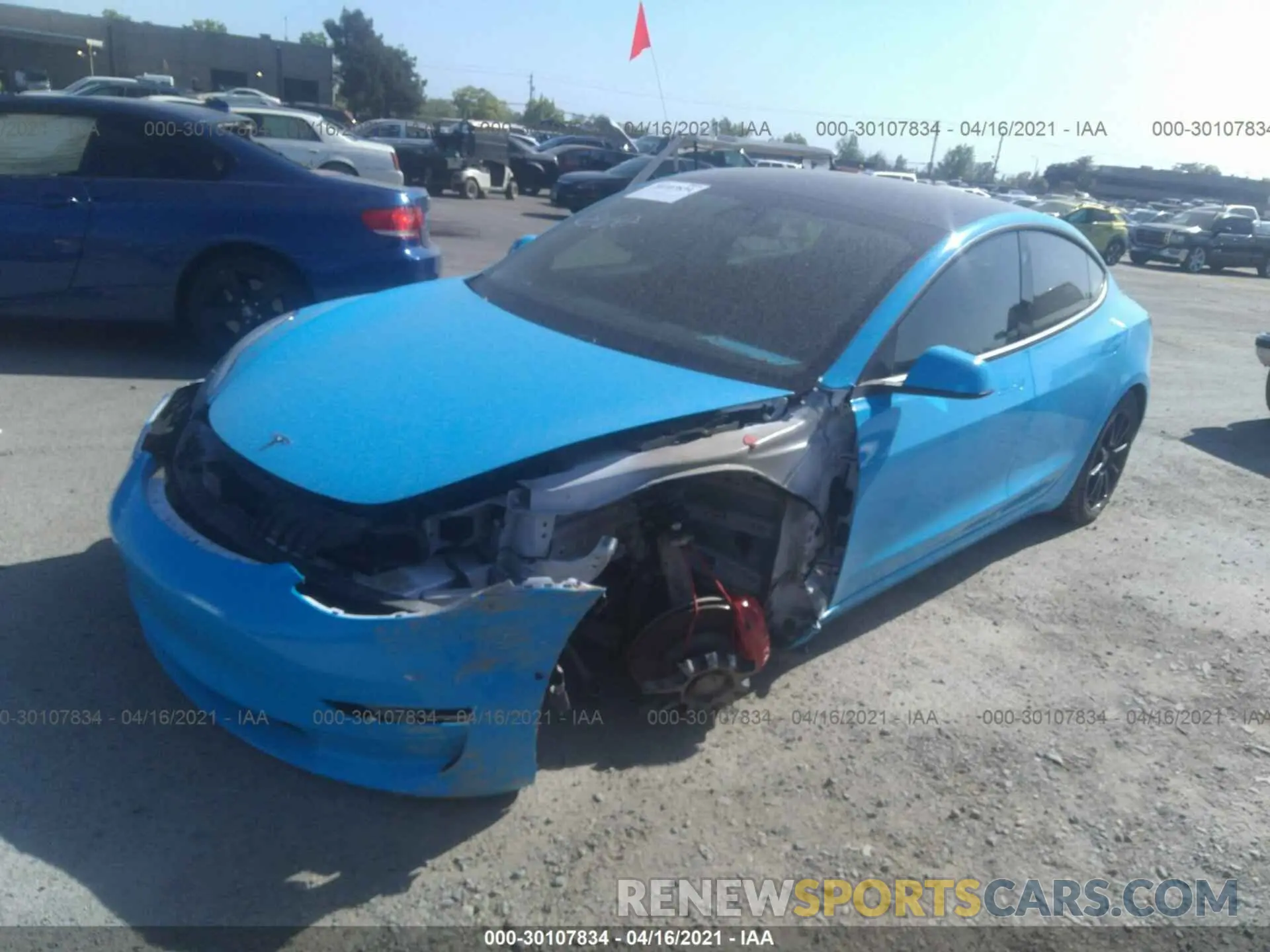 2 fotografías del automóvil dañado 5YJ3E1EC3LF719465 TESLA MODEL 3 2020