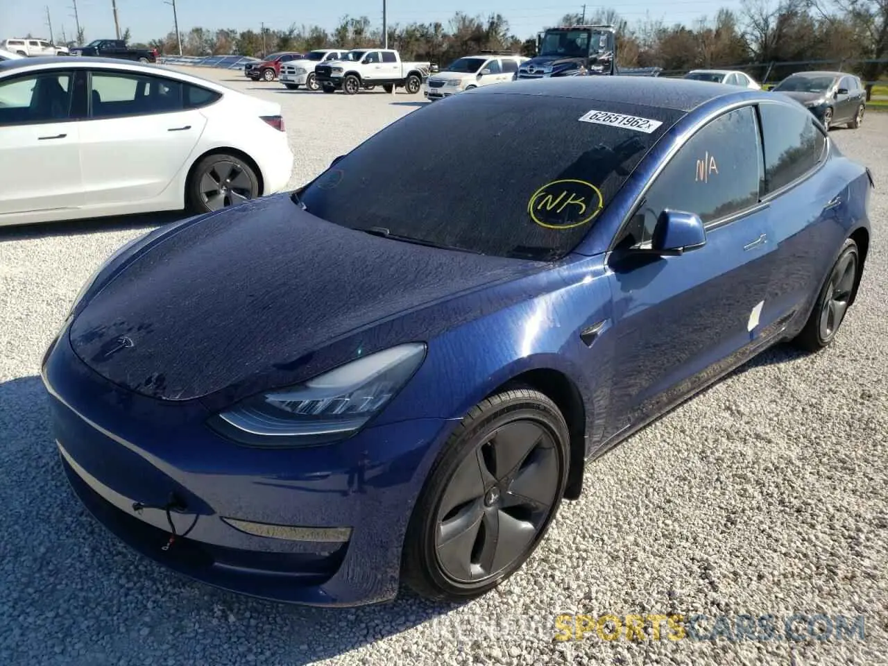 2 fotografías del automóvil dañado 5YJ3E1EC4LF586599 TESLA MODEL 3 2020