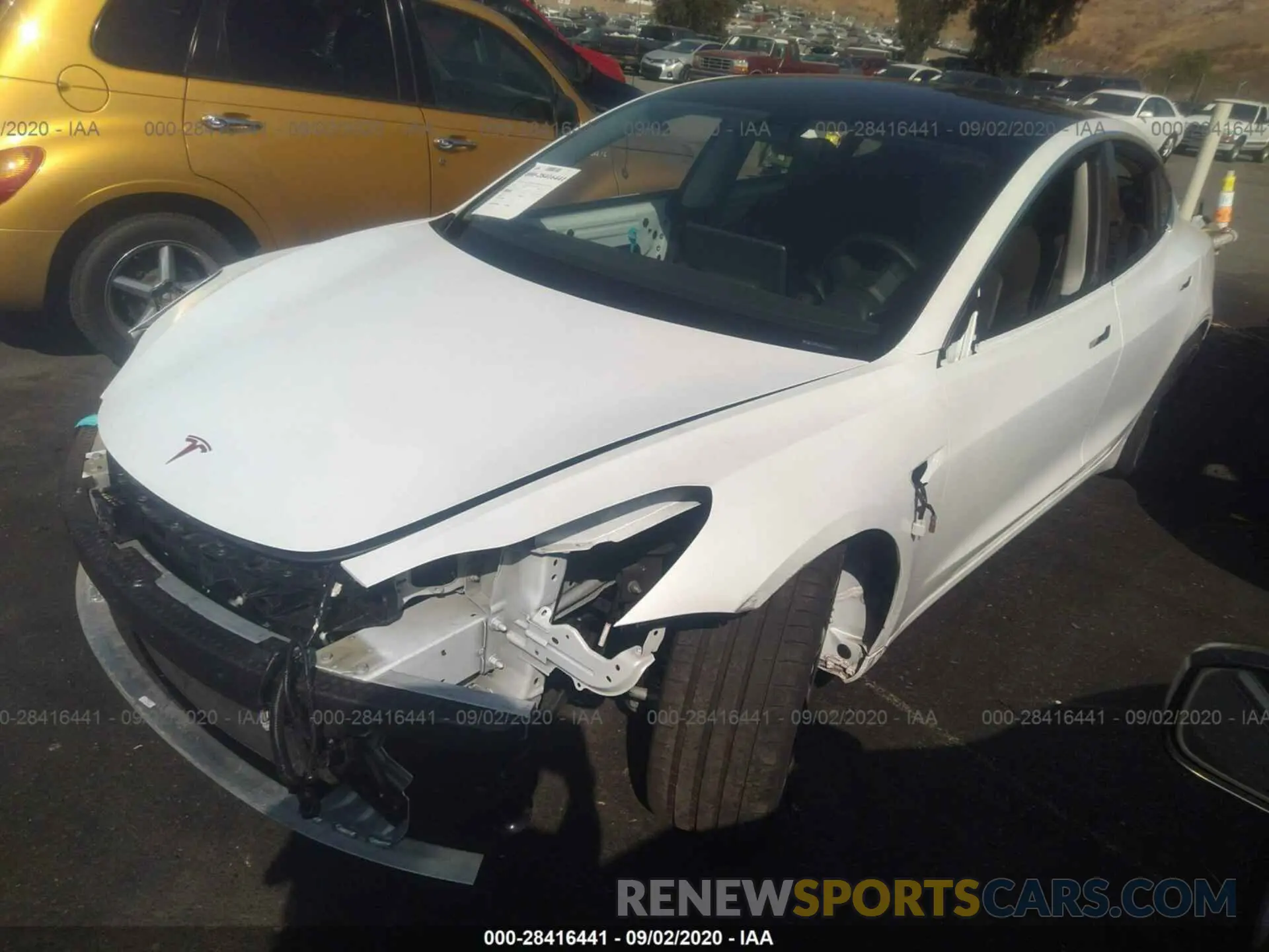 2 fotografías del automóvil dañado 5YJ3E1EC4LF641245 TESLA MODEL 3 2020