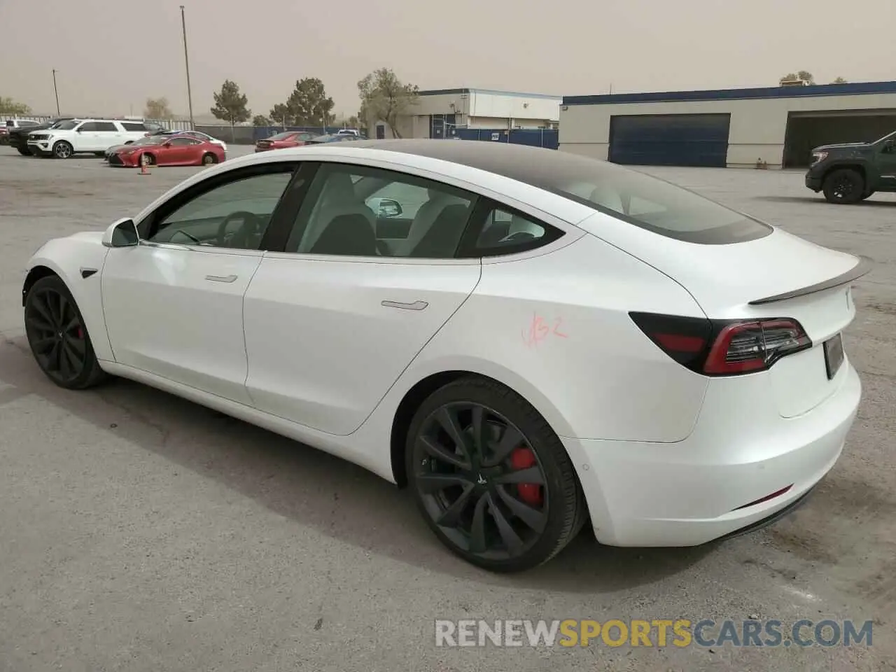 2 fotografías del automóvil dañado 5YJ3E1EC4LF642024 TESLA MODEL 3 2020
