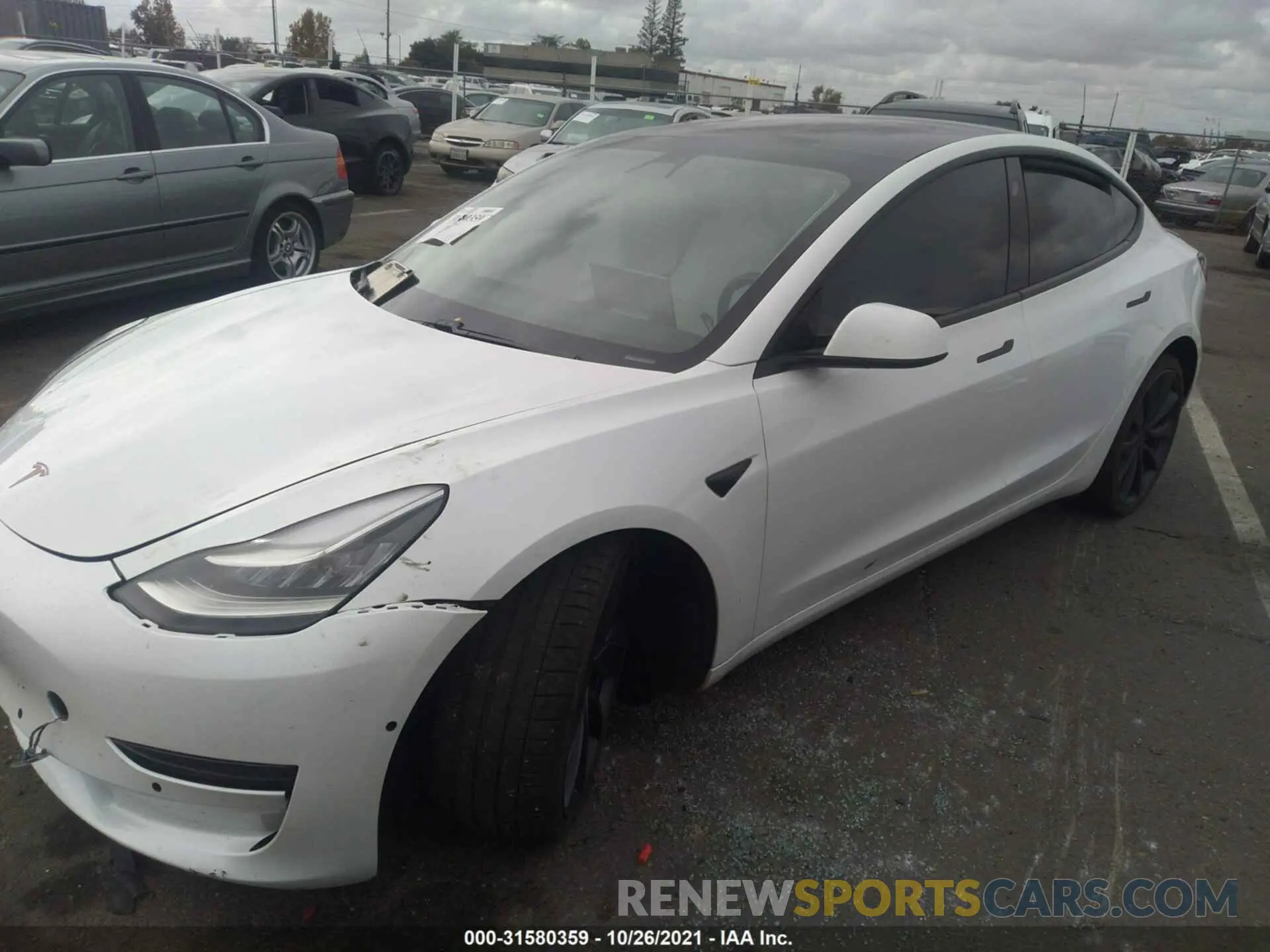 2 fotografías del automóvil dañado 5YJ3E1EC5LF642257 TESLA MODEL 3 2020