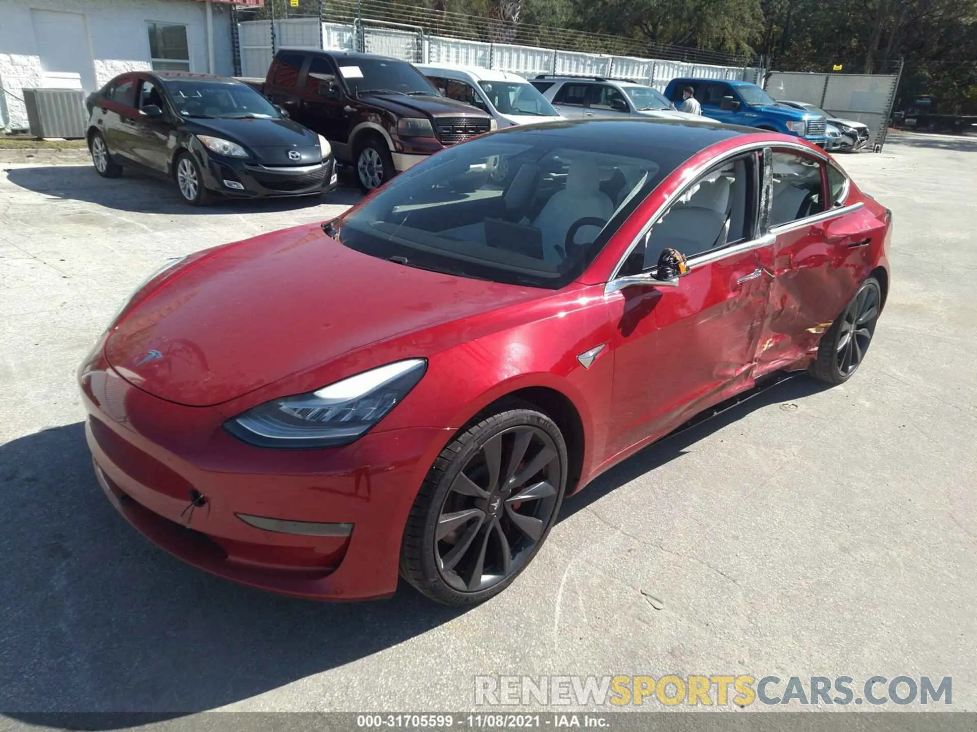 2 fotografías del automóvil dañado 5YJ3E1EC6LF669600 TESLA MODEL 3 2020