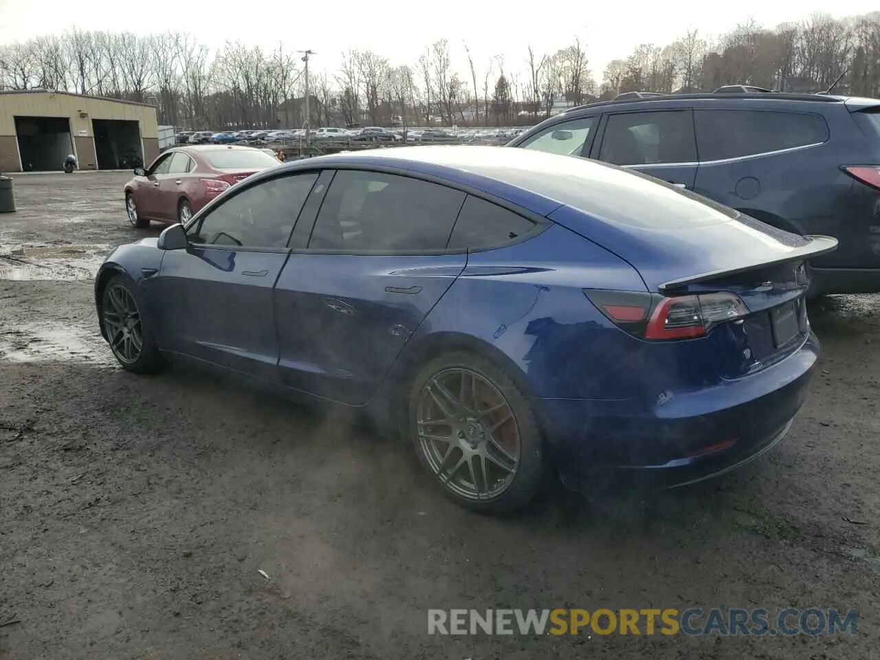 2 fotografías del automóvil dañado 5YJ3E1EC7LF669668 TESLA MODEL 3 2020