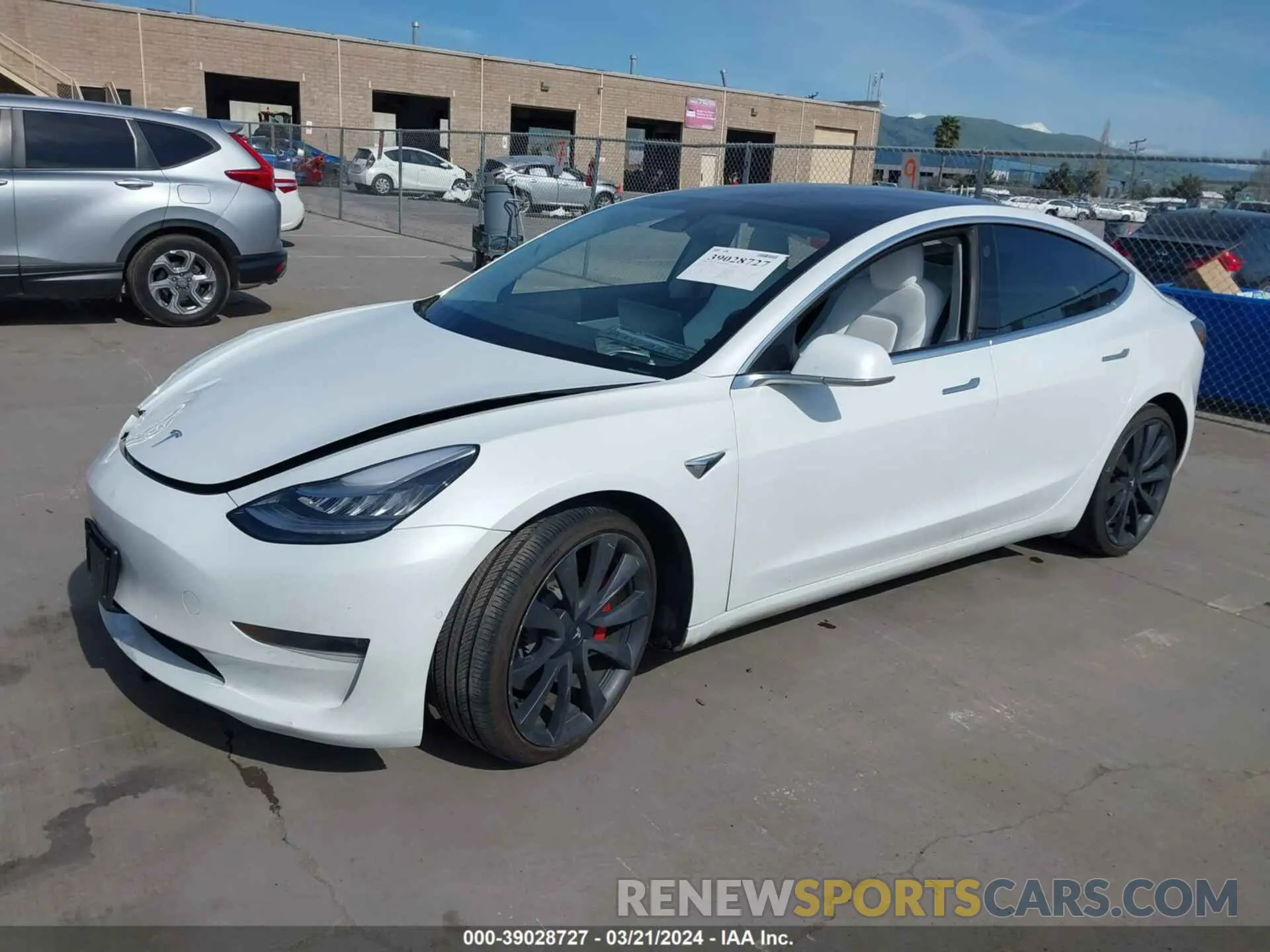 2 fotografías del automóvil dañado 5YJ3E1EC9LF792078 TESLA MODEL 3 2020