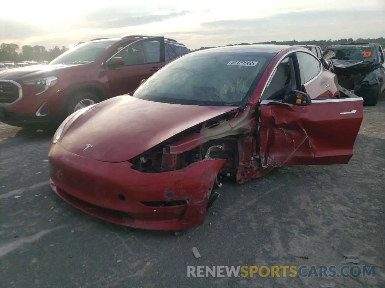 2 fotografías del automóvil dañado 5YJ3E1ECXLF641783 TESLA MODEL 3 2020