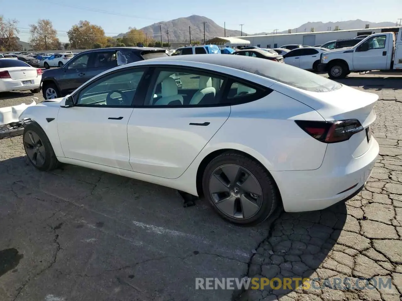 2 fotografías del automóvil dañado 5YJ3E1EA0MF100063 TESLA MODEL 3 2021