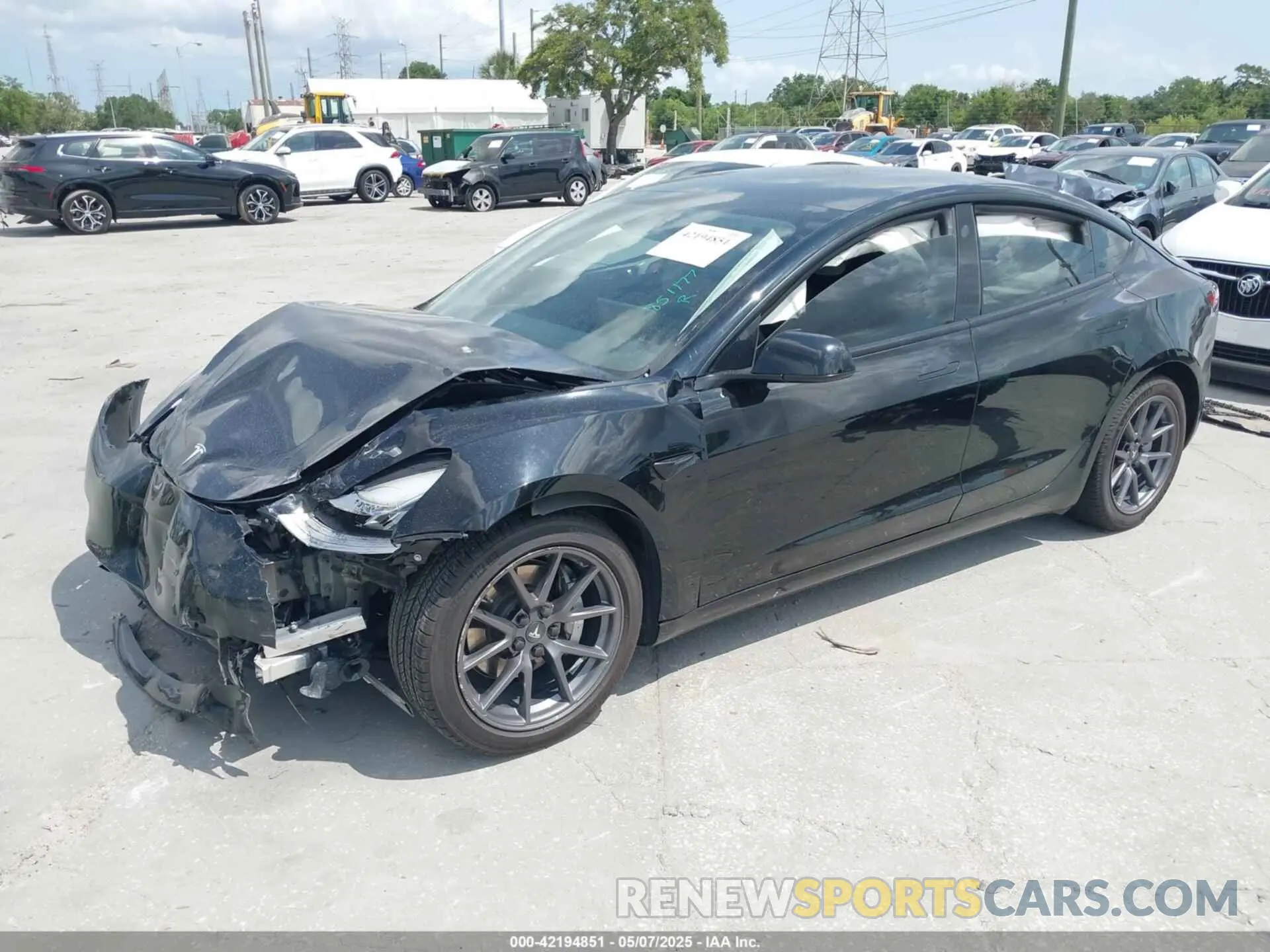 2 fotografías del automóvil dañado 5YJ3E1EA0MF851177 TESLA MODEL 3 2021