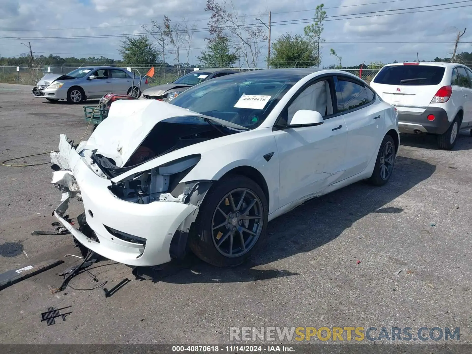 2 fotografías del automóvil dañado 5YJ3E1EA0MF907974 TESLA MODEL 3 2021