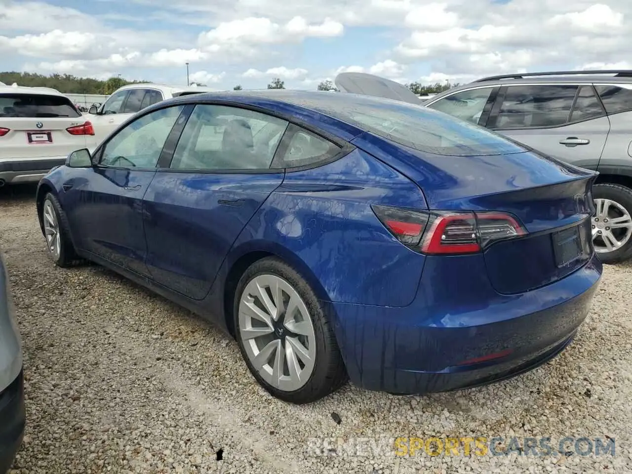 2 fotografías del automóvil dañado 5YJ3E1EA0MF990757 TESLA MODEL 3 2021