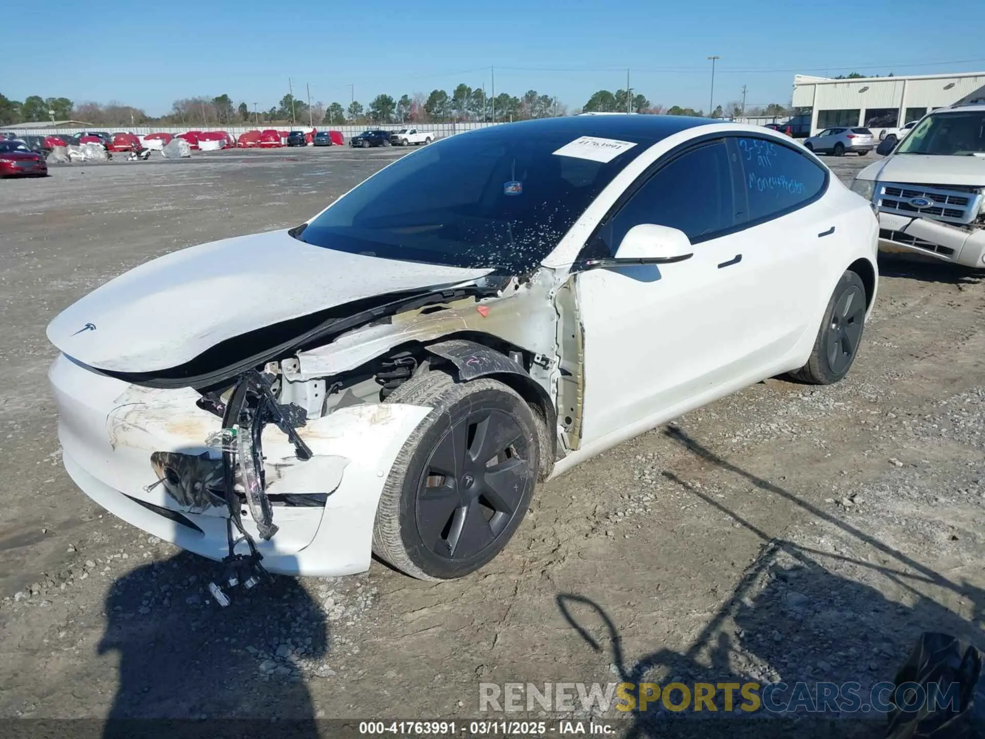 2 fotografías del automóvil dañado 5YJ3E1EA1MF016656 TESLA MODEL 3 2021