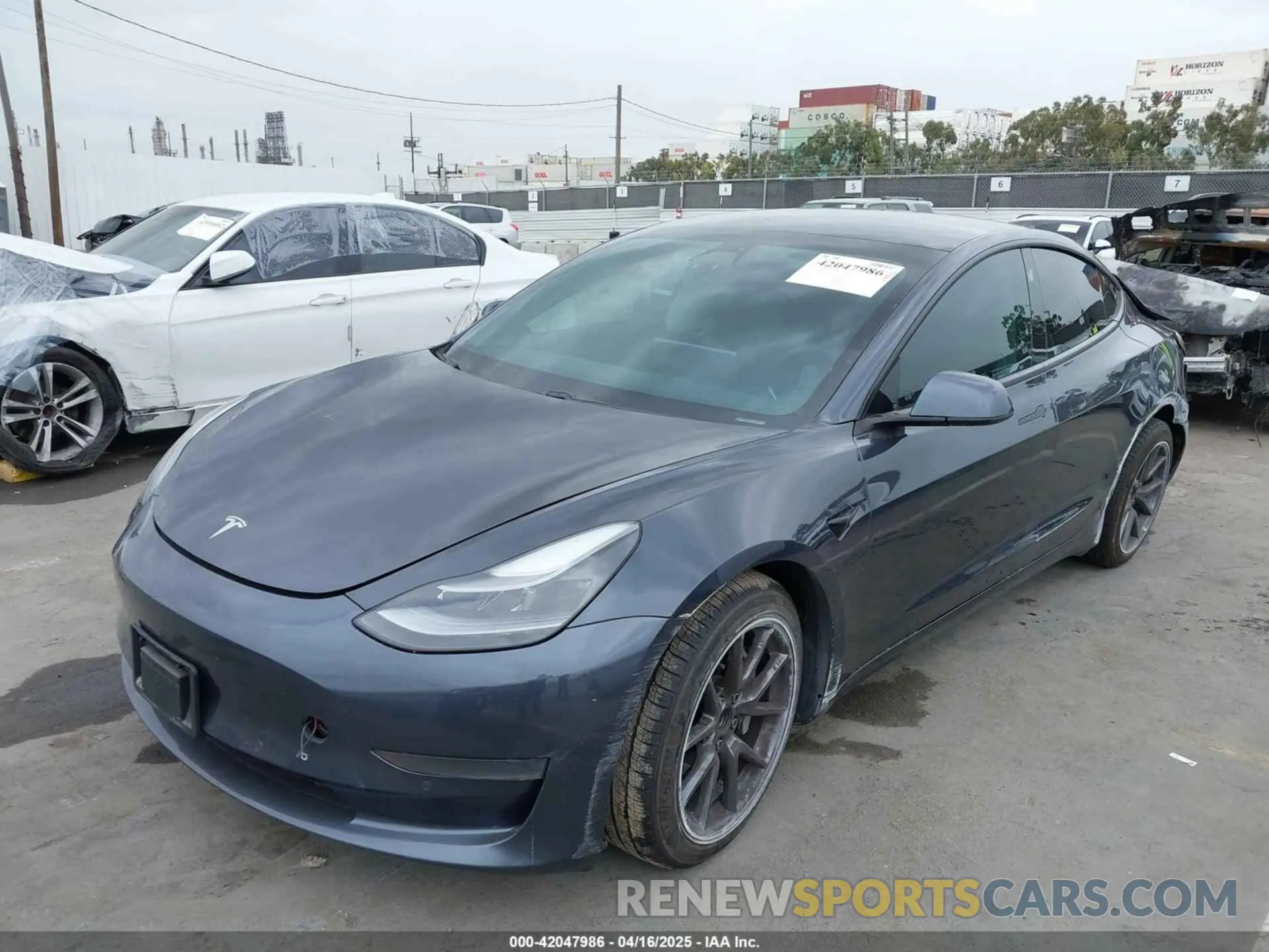 2 fotografías del automóvil dañado 5YJ3E1EA1MF068787 TESLA MODEL 3 2021