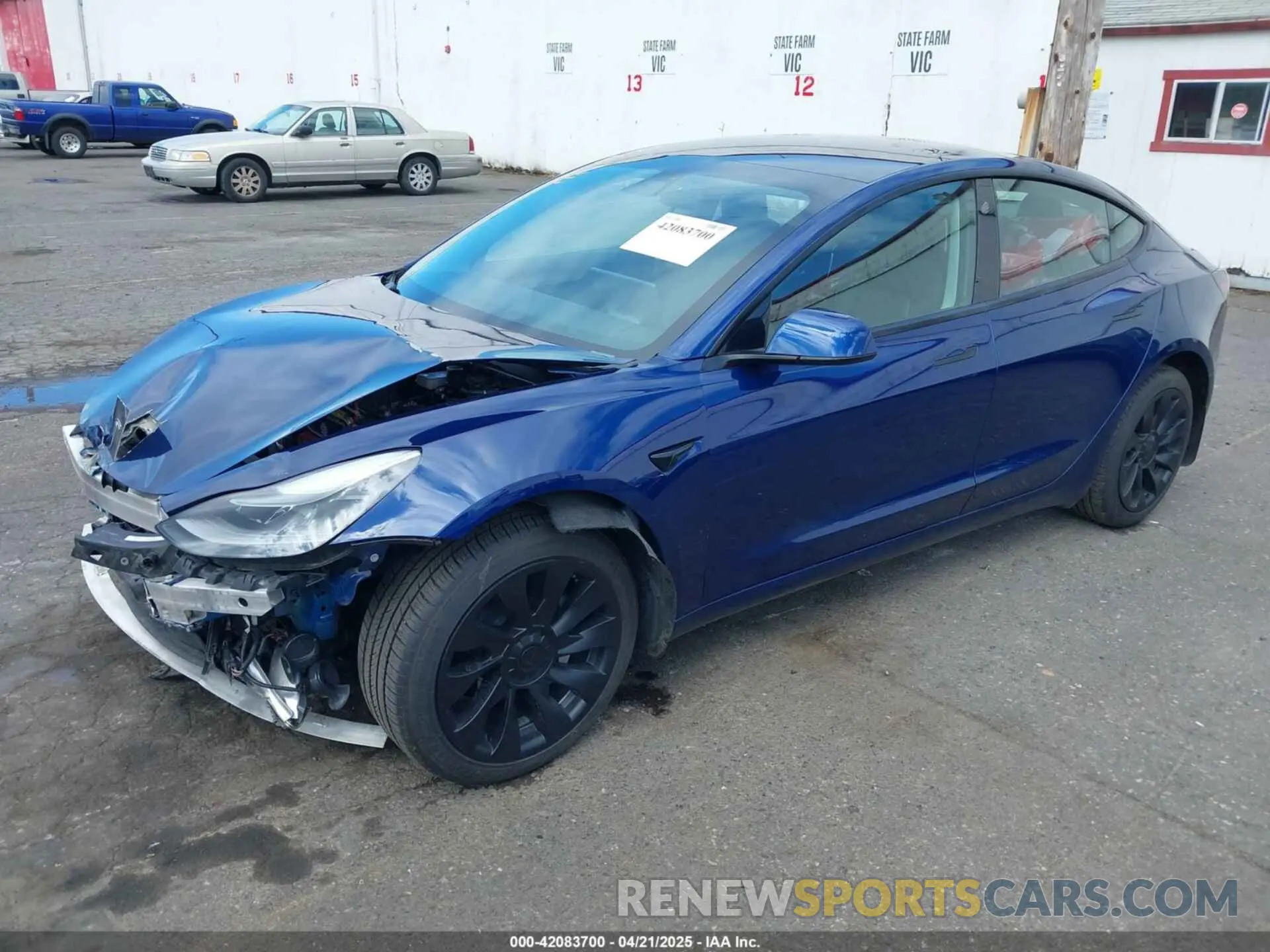 2 fotografías del automóvil dañado 5YJ3E1EA1MF094693 TESLA MODEL 3 2021