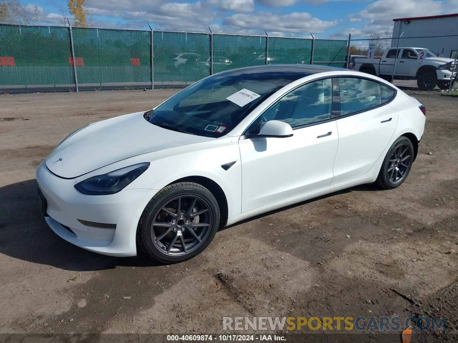 2 fotografías del automóvil dañado 5YJ3E1EA1MF096718 TESLA MODEL 3 2021