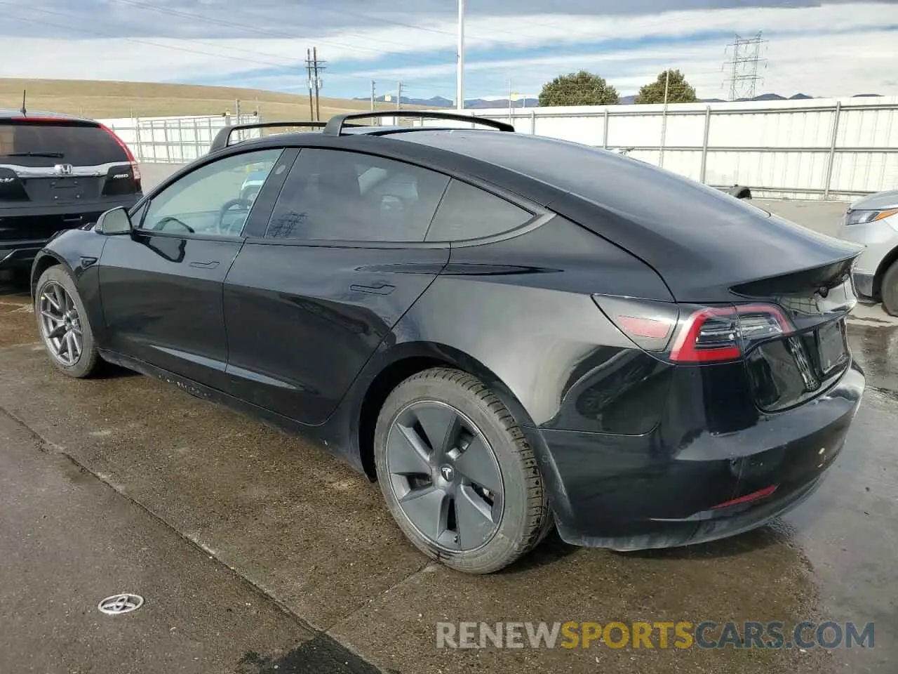 2 fotografías del automóvil dañado 5YJ3E1EA1MF876427 TESLA MODEL 3 2021