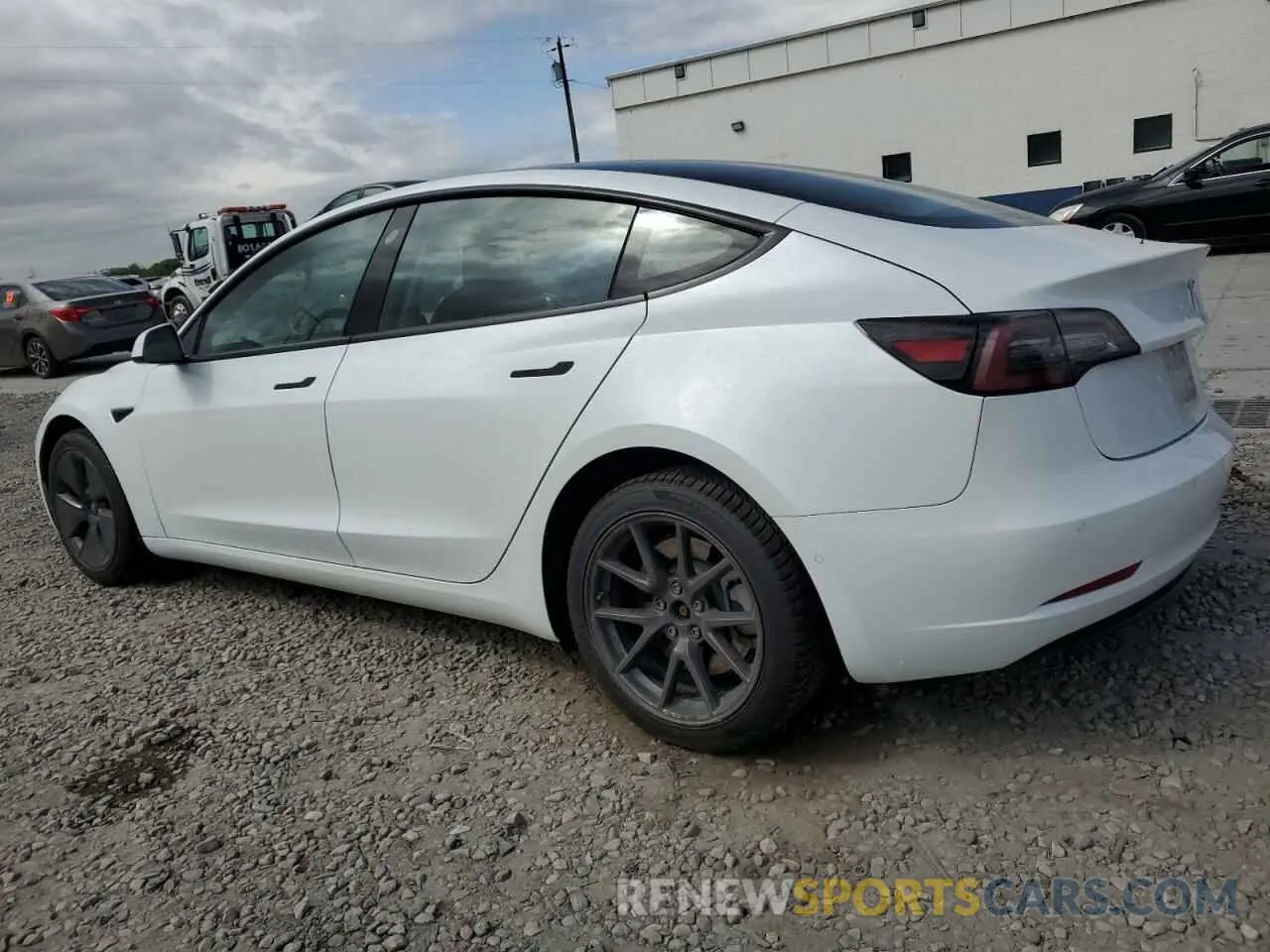 2 fotografías del automóvil dañado 5YJ3E1EA1MF997586 TESLA MODEL 3 2021