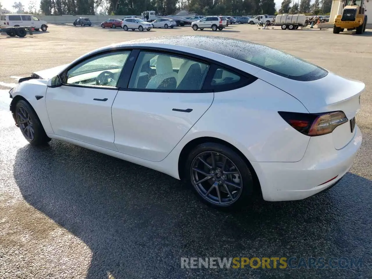 2 fotografías del automóvil dañado 5YJ3E1EA2MF873424 TESLA MODEL 3 2021