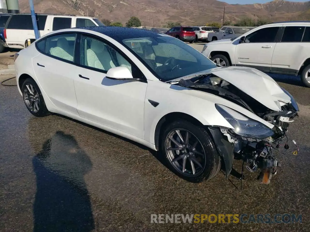 4 fotografías del automóvil dañado 5YJ3E1EA2MF873424 TESLA MODEL 3 2021
