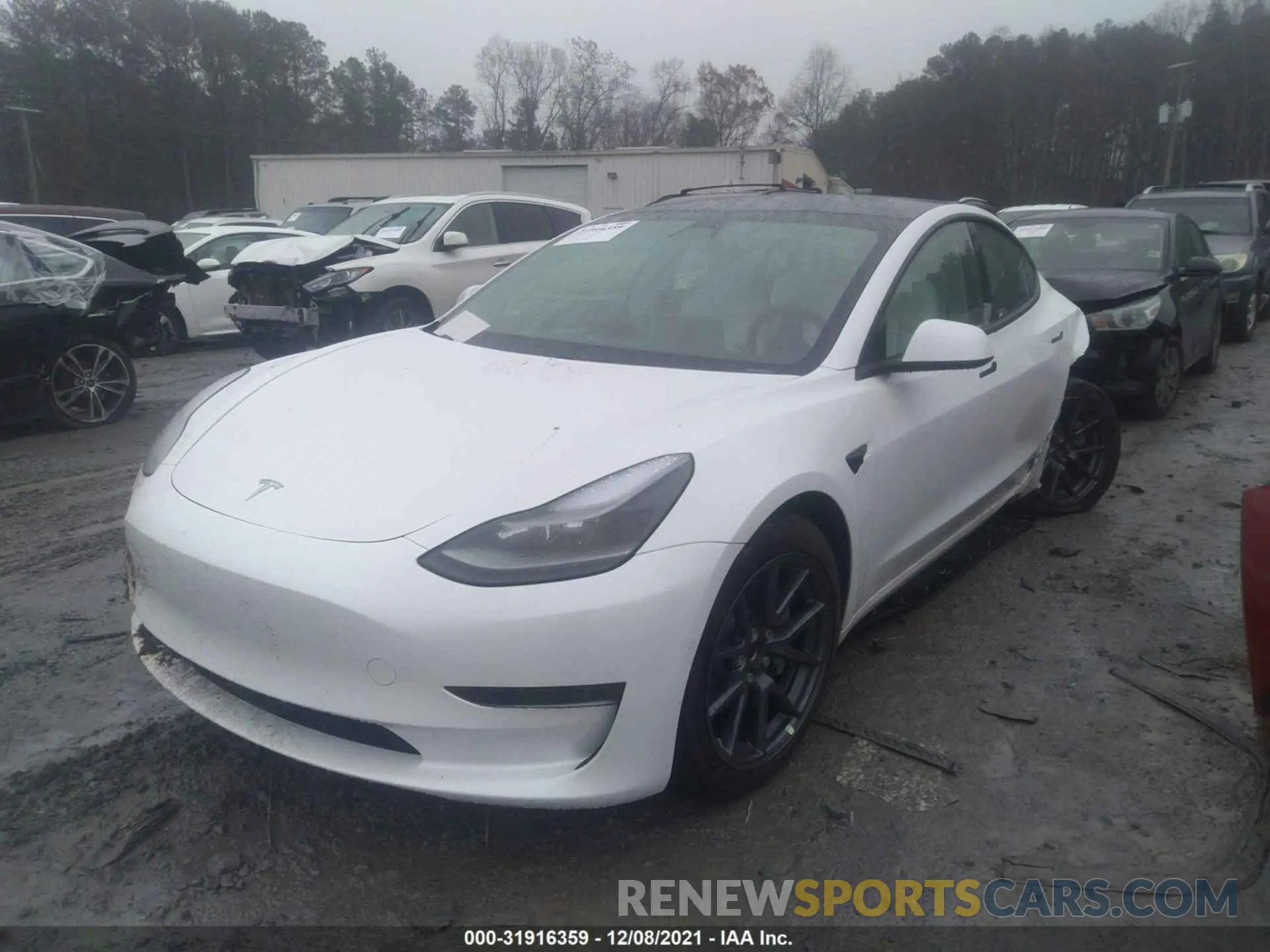 2 fotografías del automóvil dañado 5YJ3E1EA2MF987603 TESLA MODEL 3 2021