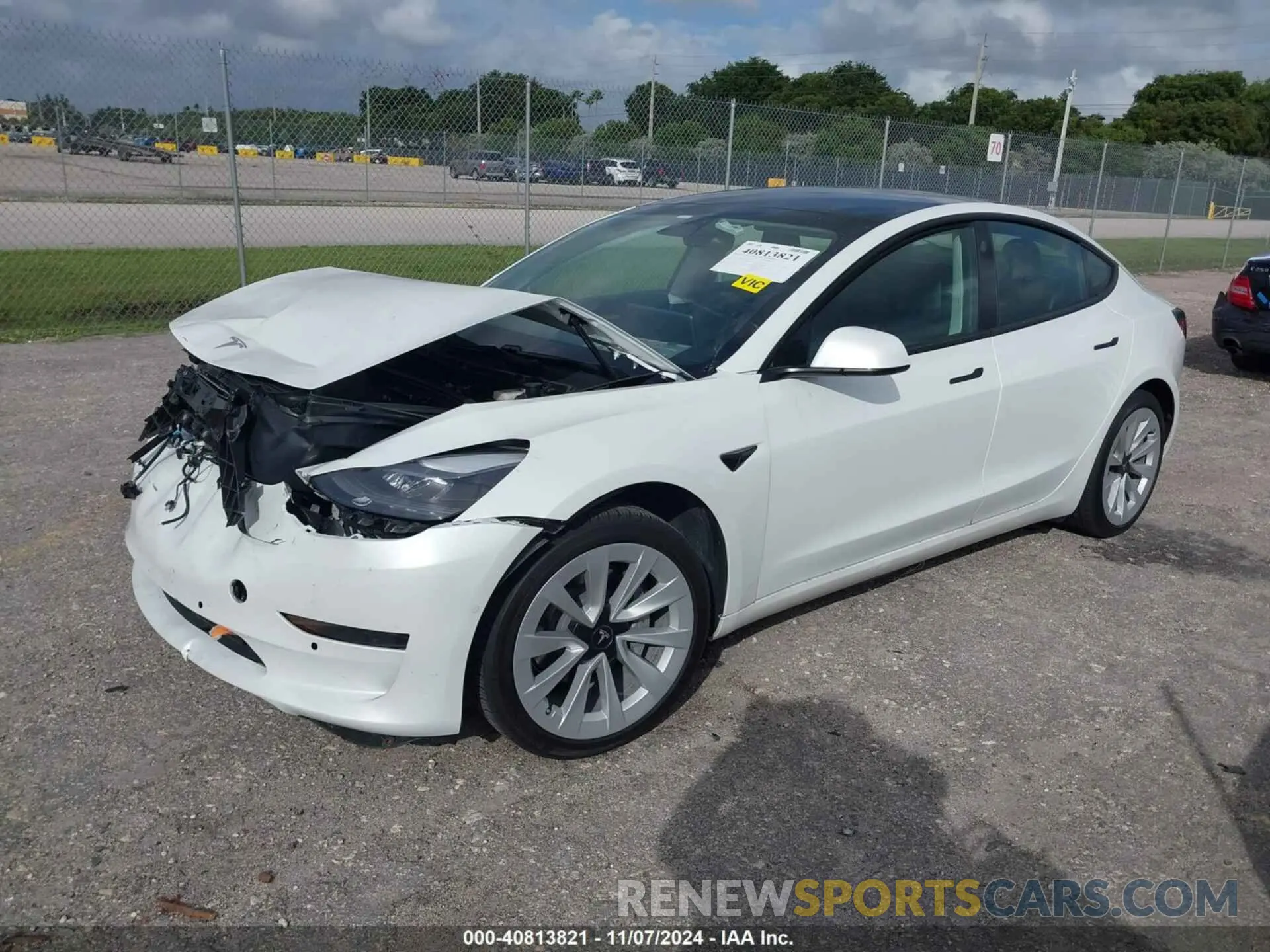 2 fotografías del automóvil dañado 5YJ3E1EA2MF990842 TESLA MODEL 3 2021