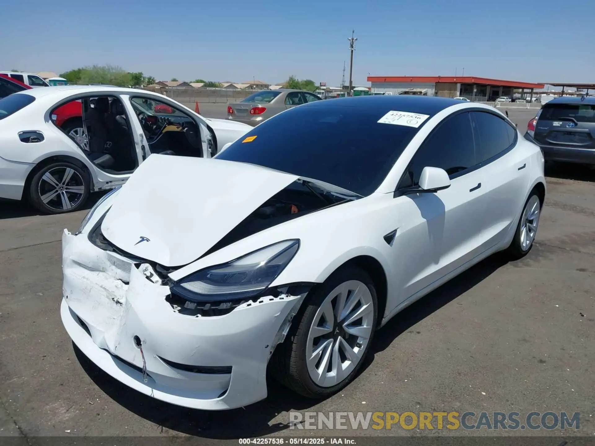 2 fotografías del automóvil dañado 5YJ3E1EA3MF075594 TESLA MODEL 3 2021
