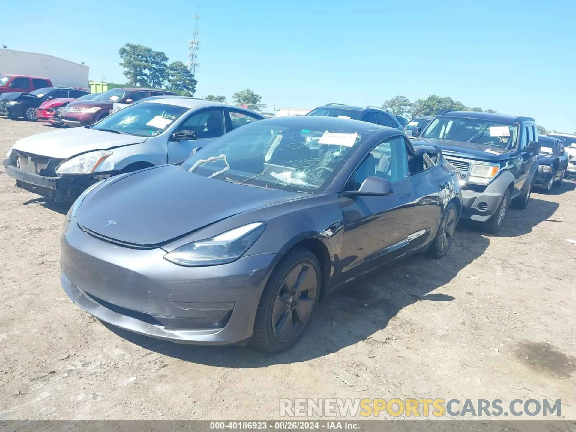 2 fotografías del automóvil dañado 5YJ3E1EA3MF857605 TESLA MODEL 3 2021