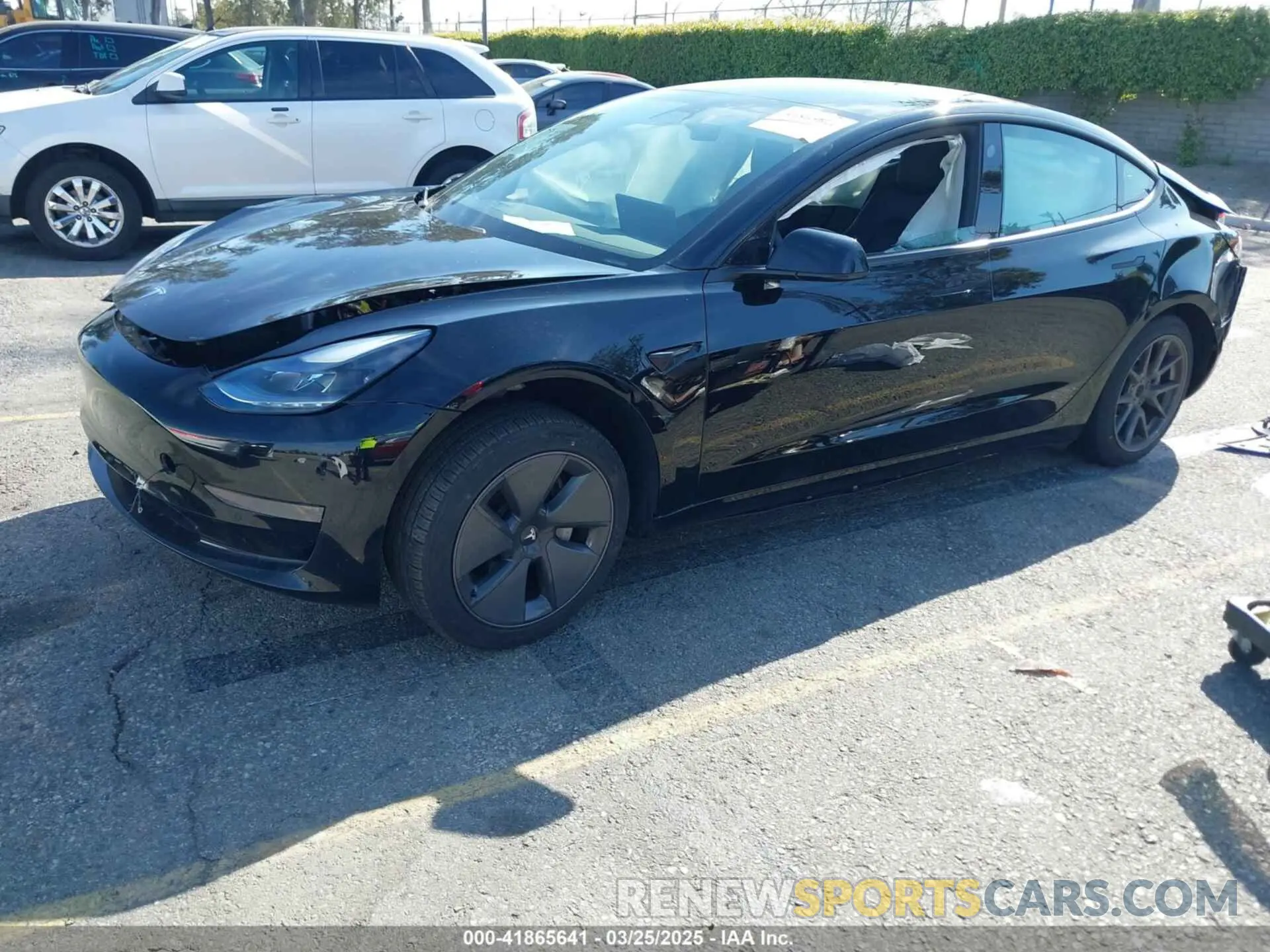 2 fotografías del automóvil dañado 5YJ3E1EA4MF002203 TESLA MODEL 3 2021