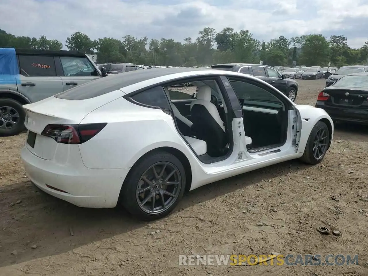 3 fotografías del automóvil dañado 5YJ3E1EA4MF018563 TESLA MODEL 3 2021