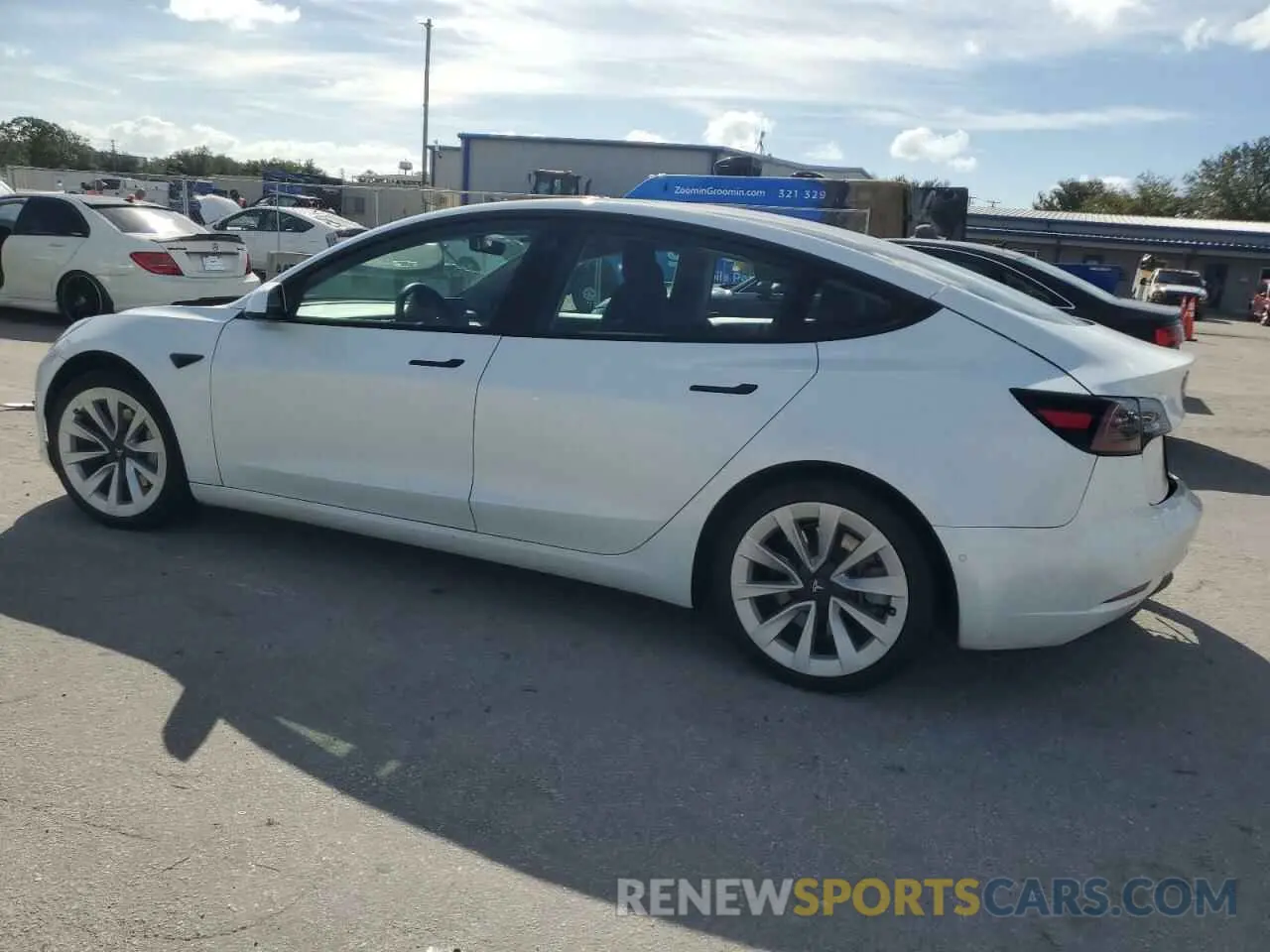 2 fotografías del automóvil dañado 5YJ3E1EA4MF838500 TESLA MODEL 3 2021