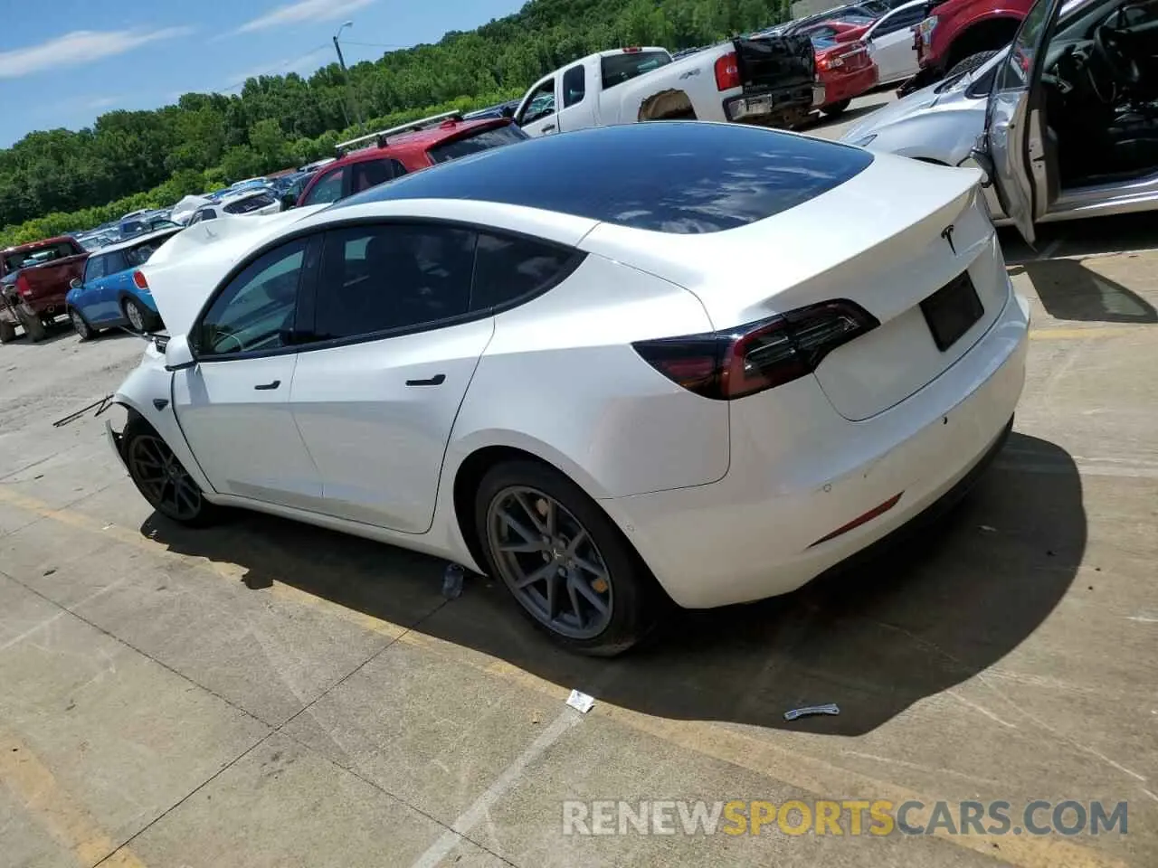 2 fotografías del automóvil dañado 5YJ3E1EA4MF929654 TESLA MODEL 3 2021