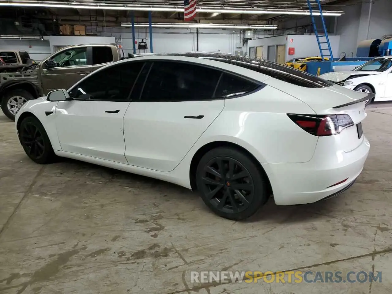 2 fotografías del automóvil dañado 5YJ3E1EA4MF943036 TESLA MODEL 3 2021