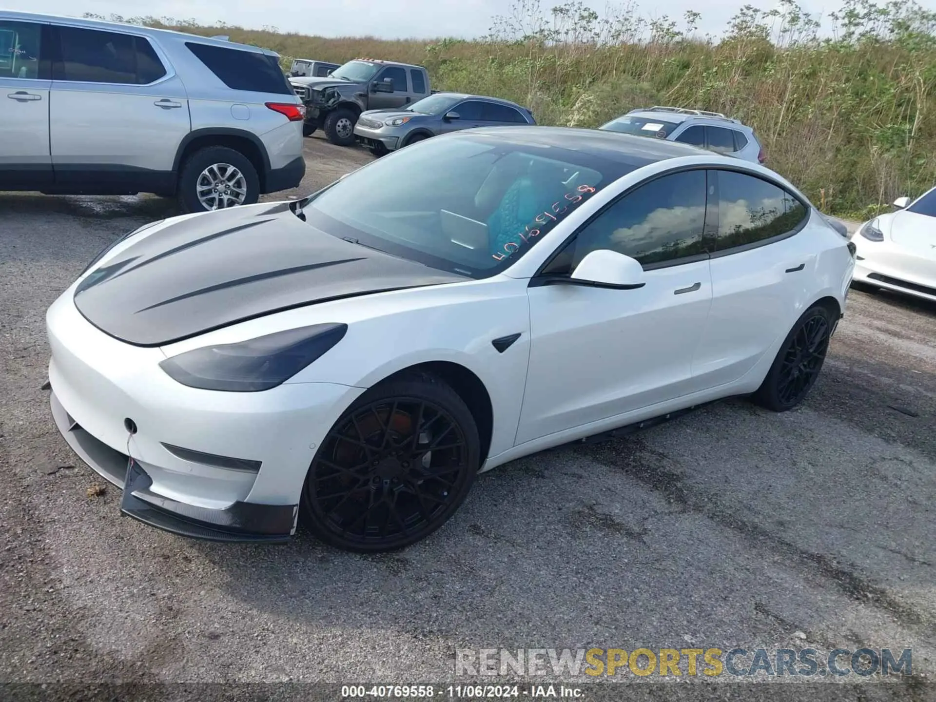 2 fotografías del automóvil dañado 5YJ3E1EA4MF978448 TESLA MODEL 3 2021