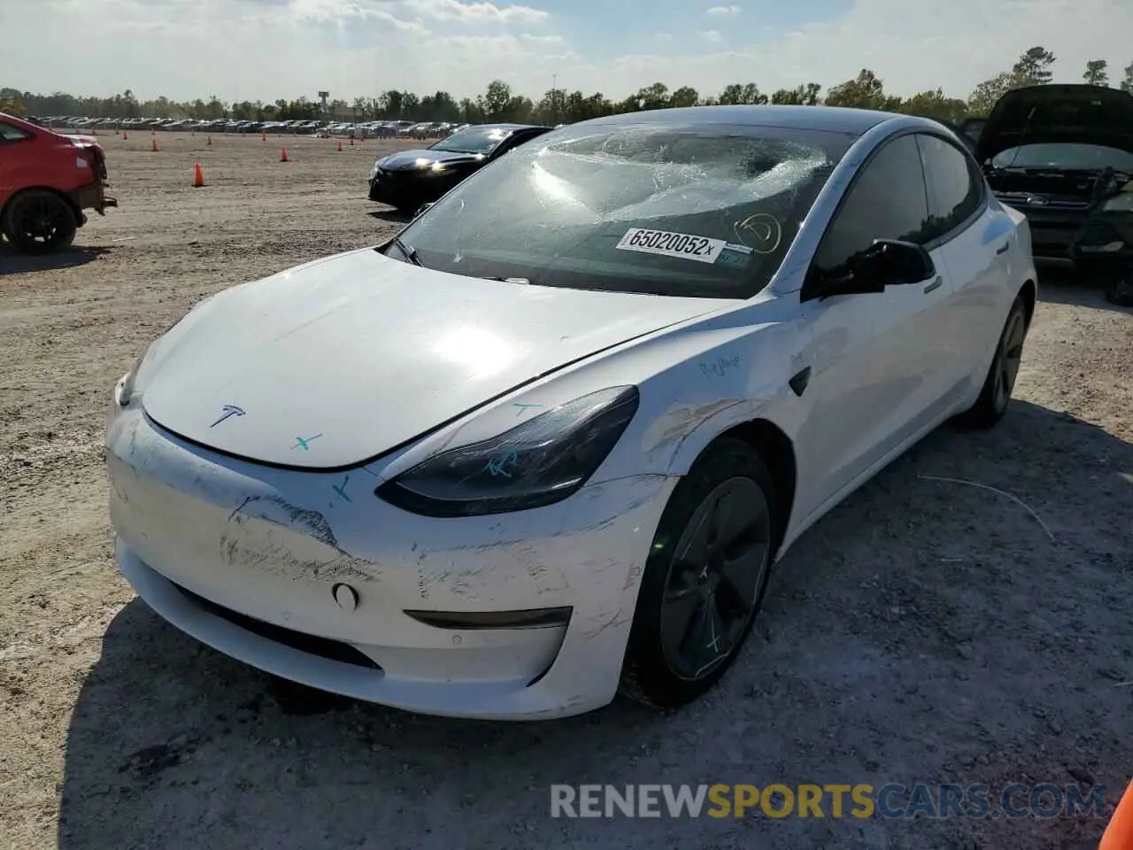 2 fotografías del automóvil dañado 5YJ3E1EA4MF991541 TESLA MODEL 3 2021