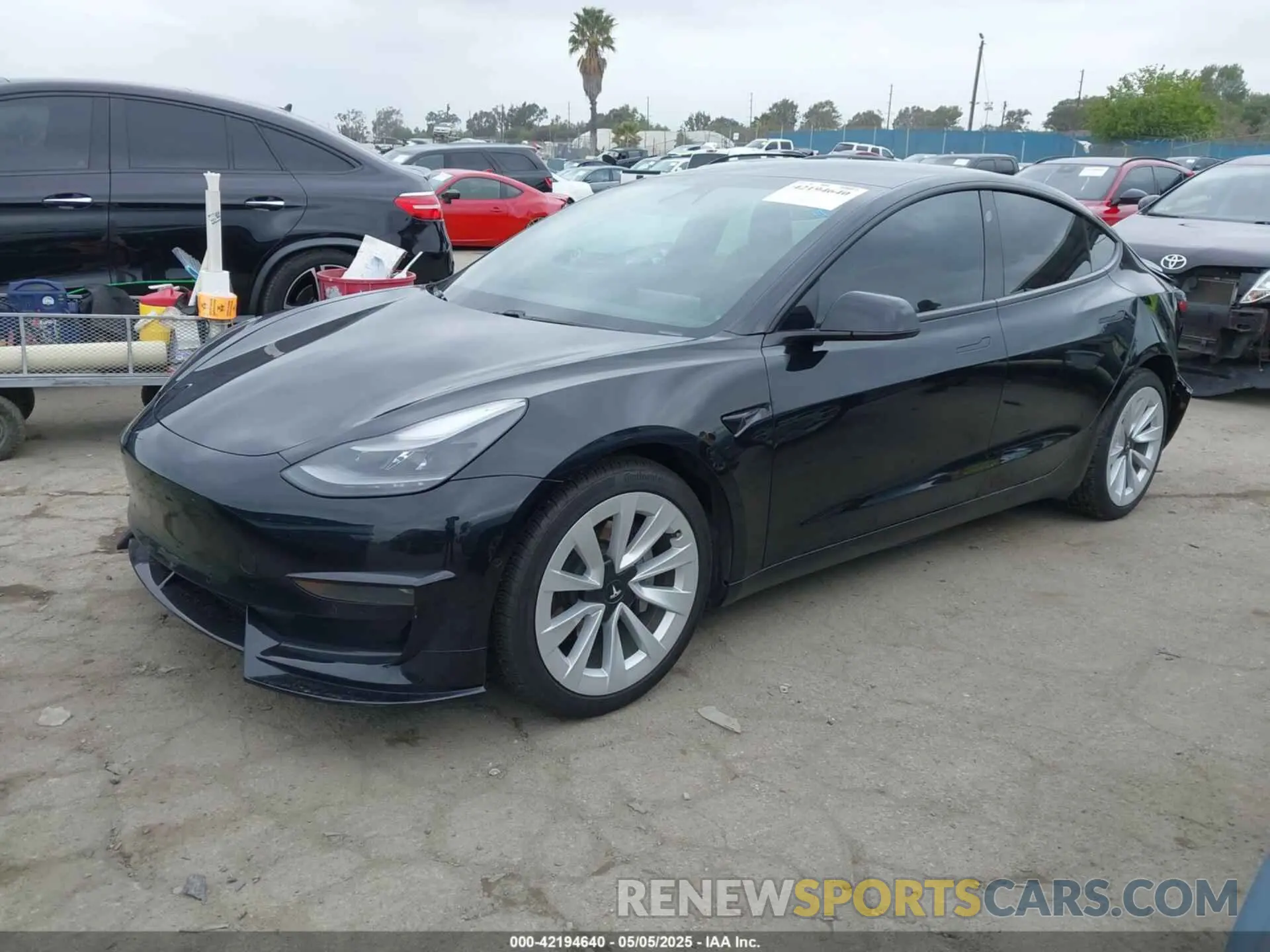 2 fotografías del automóvil dañado 5YJ3E1EA5MF938928 TESLA MODEL 3 2021