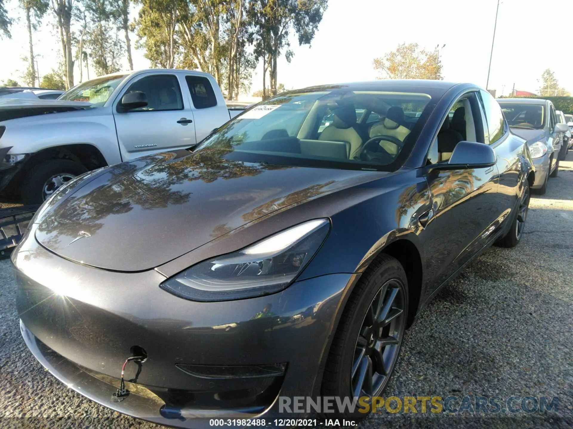 2 fotografías del automóvil dañado 5YJ3E1EA5MF940128 TESLA MODEL 3 2021