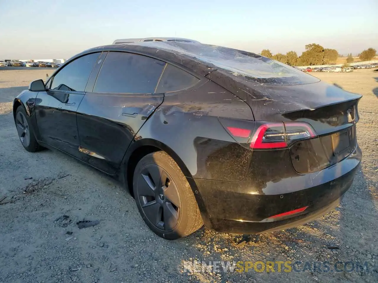 2 fotografías del automóvil dañado 5YJ3E1EA6MF067098 TESLA MODEL 3 2021
