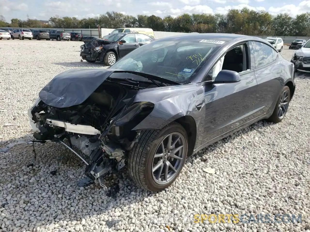 2 fotografías del automóvil dañado 5YJ3E1EA6MF994716 TESLA MODEL 3 2021