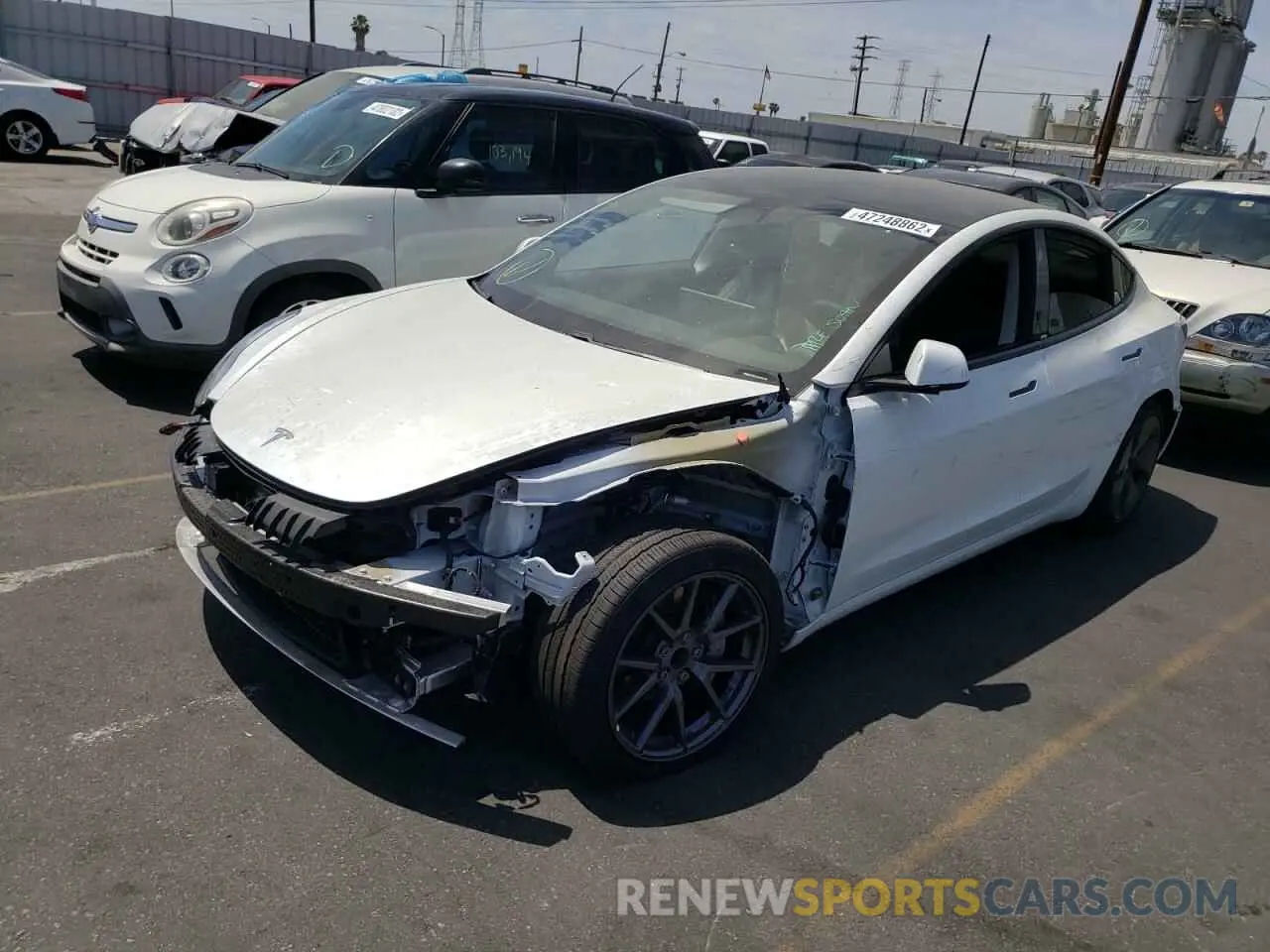 2 fotografías del automóvil dañado 5YJ3E1EA7MF940308 TESLA MODEL 3 2021