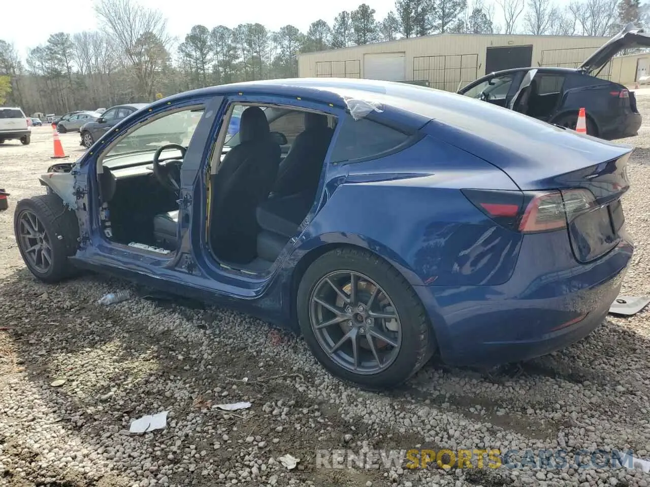 2 fotografías del automóvil dañado 5YJ3E1EA7MF986205 TESLA MODEL 3 2021