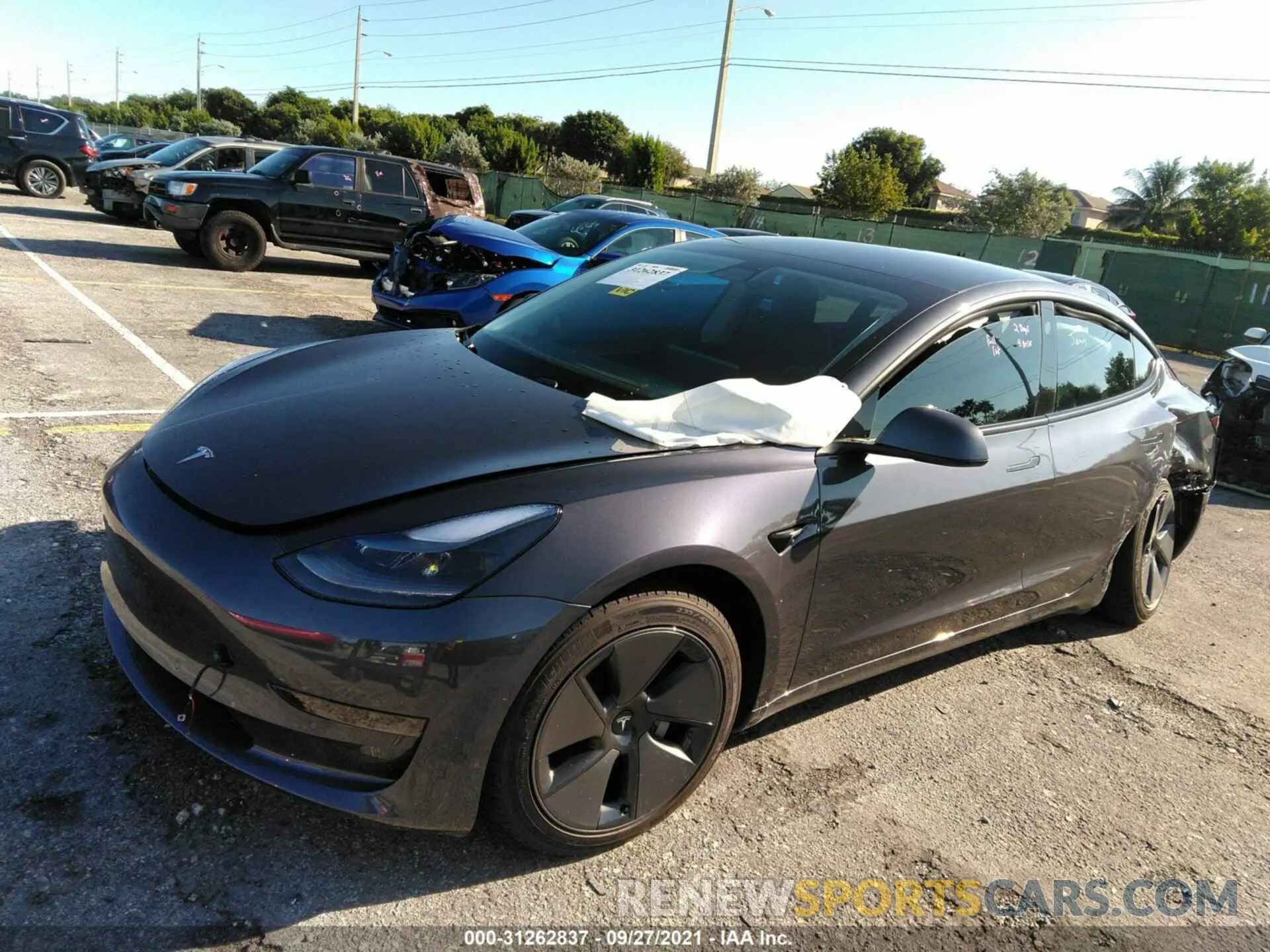 2 fotografías del automóvil dañado 5YJ3E1EA8MF030456 TESLA MODEL 3 2021