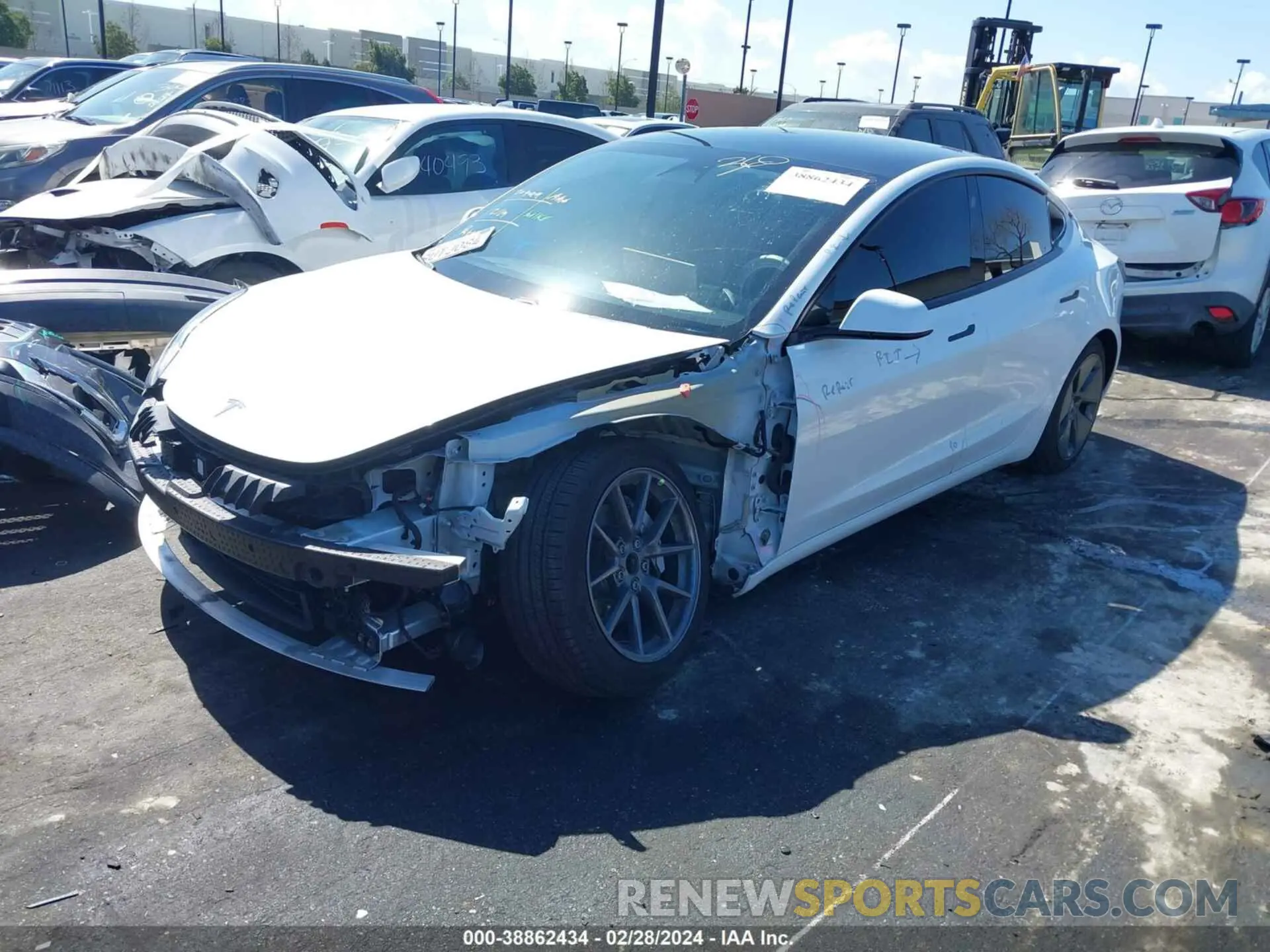 2 fotografías del automóvil dañado 5YJ3E1EA8MF878739 TESLA MODEL 3 2021