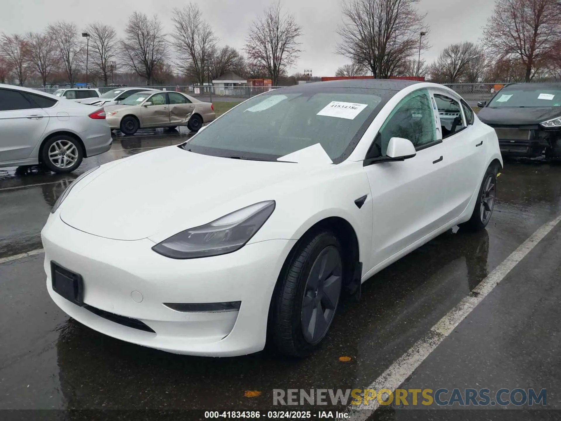2 fotografías del automóvil dañado 5YJ3E1EAXMF052765 TESLA MODEL 3 2021