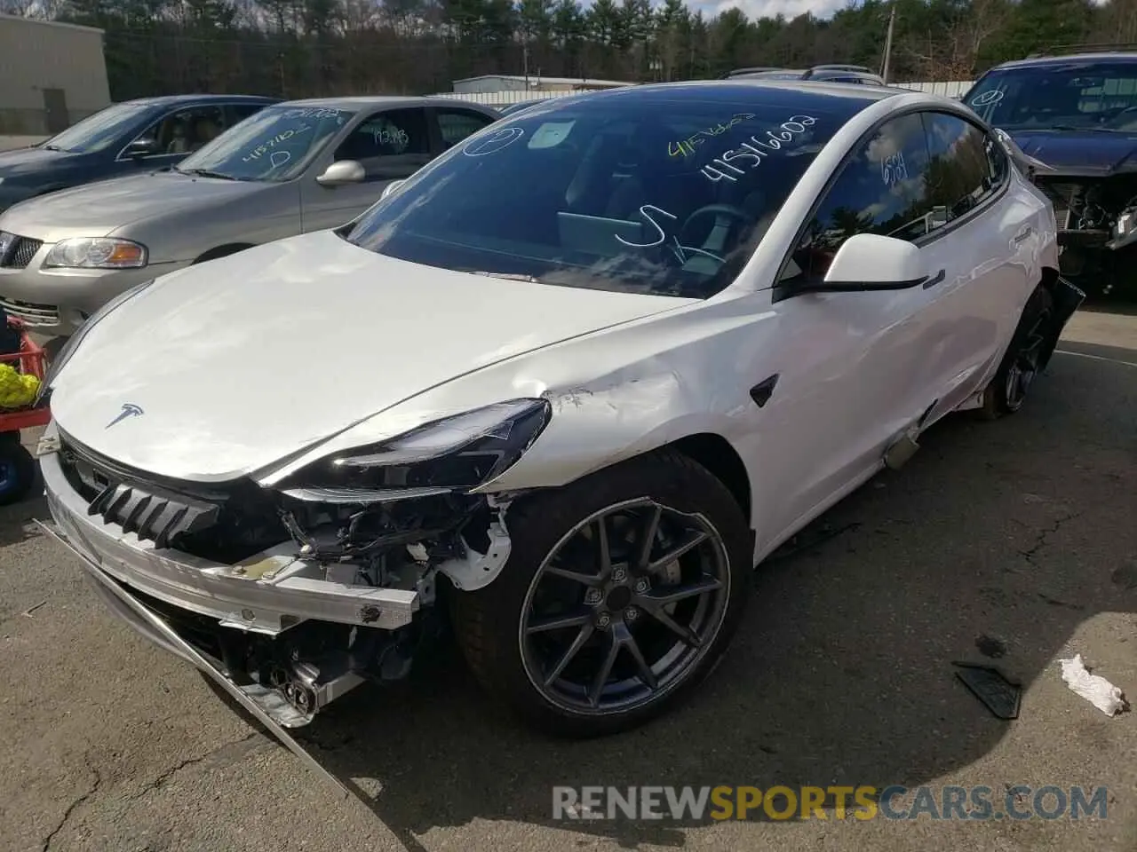 2 fotografías del automóvil dañado 5YJ3E1EAXMF085636 TESLA MODEL 3 2021