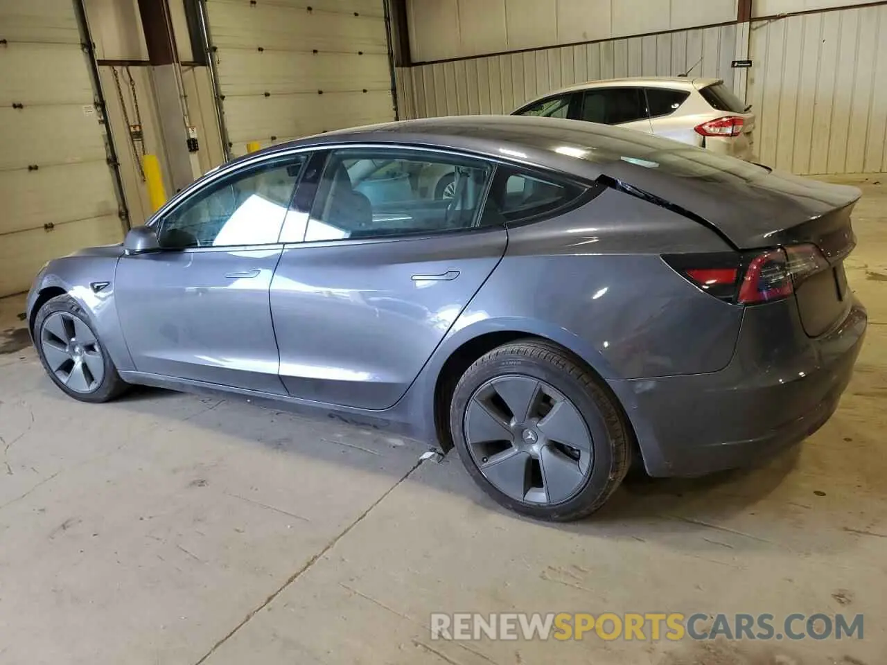 2 fotografías del automóvil dañado 5YJ3E1EAXMF086348 TESLA MODEL 3 2021